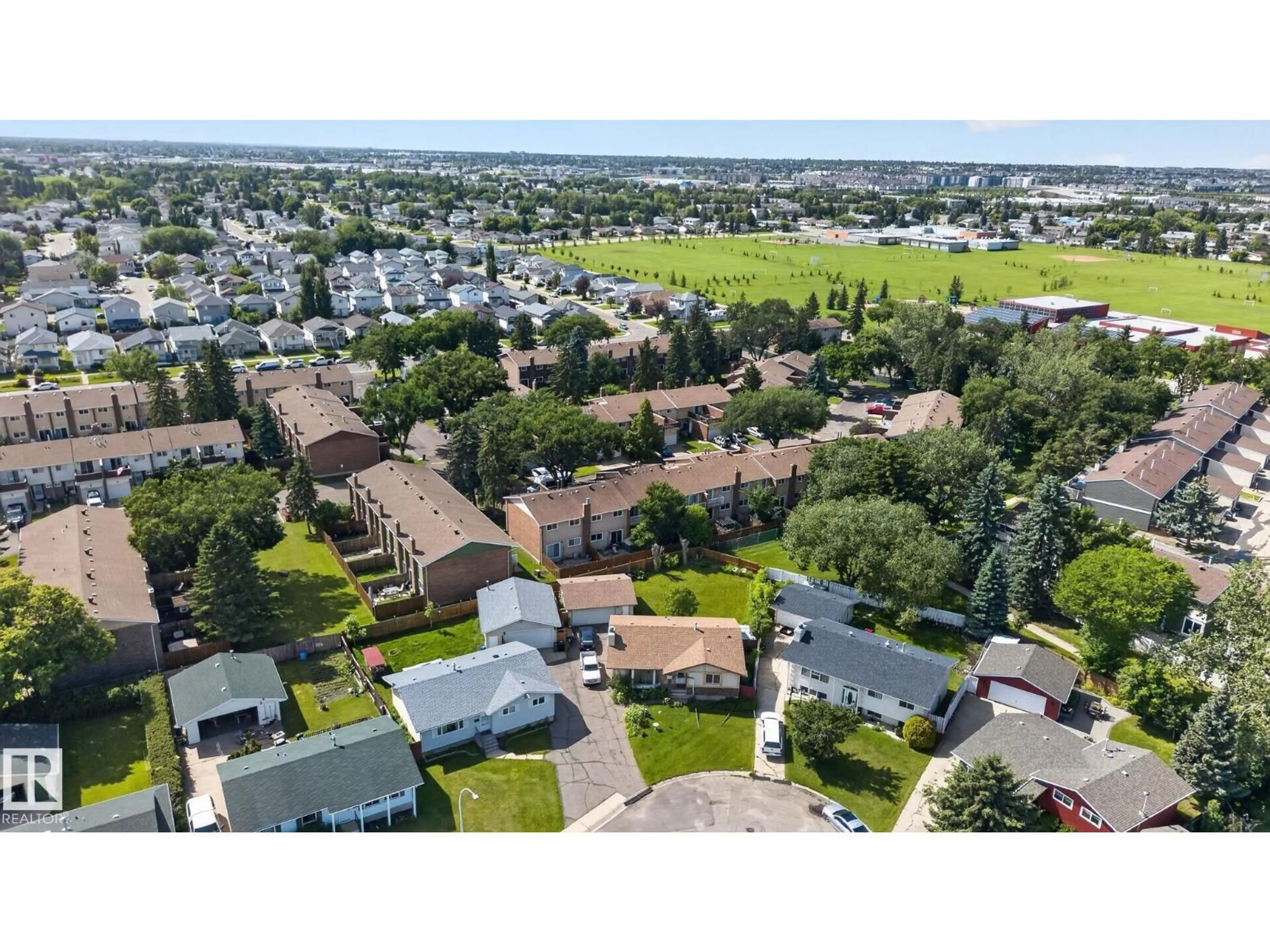 A pic from outside/outdoor area/front of a property/back of a property/a pic from drone, street for 13050 32A ST, Edmonton Alberta T5A3E5