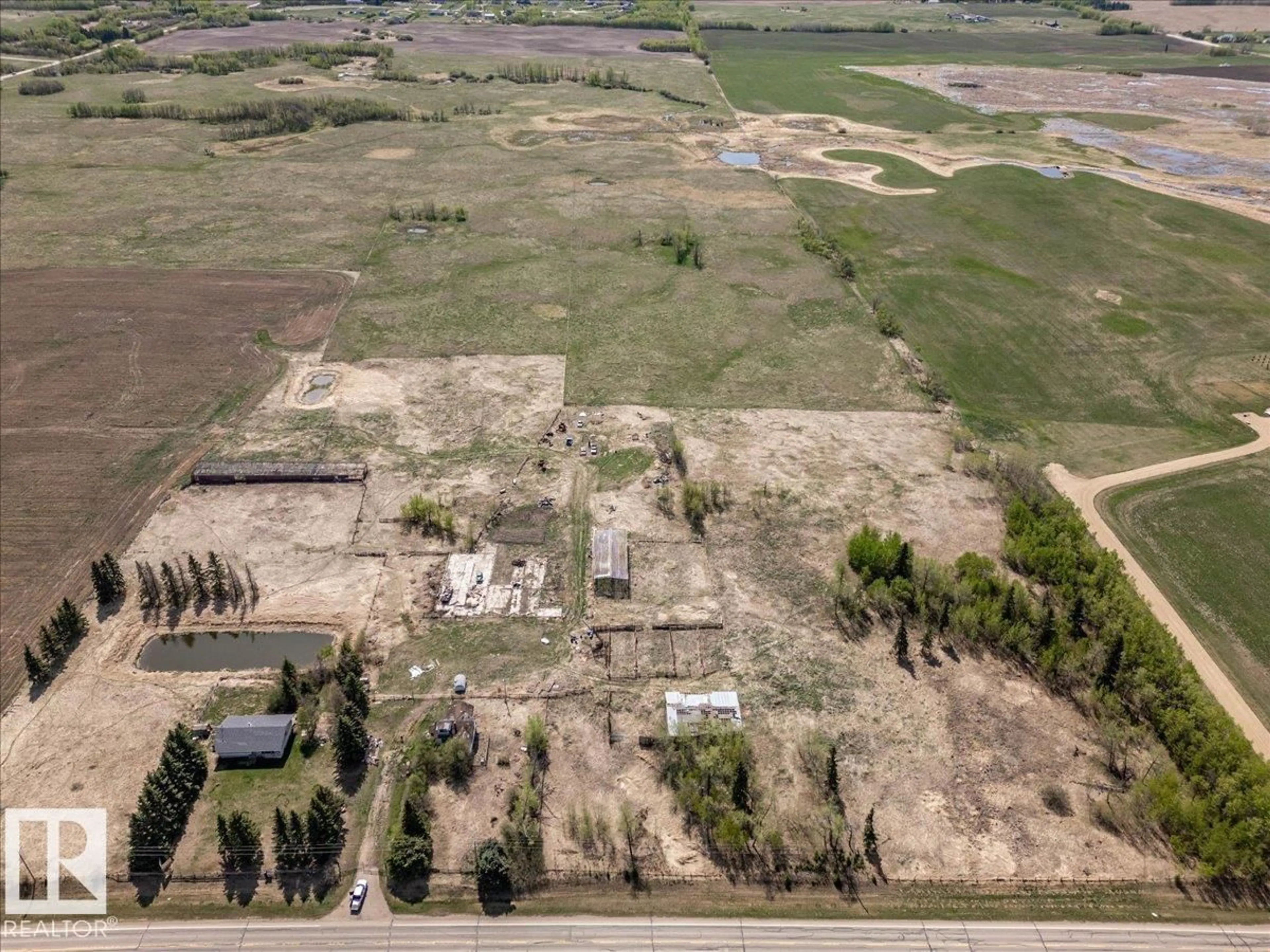 A pic from outside/outdoor area/front of a property/back of a property/a pic from drone, building for 23331 TWP ROAD 502, Rural Leduc County Alberta T4X0R4