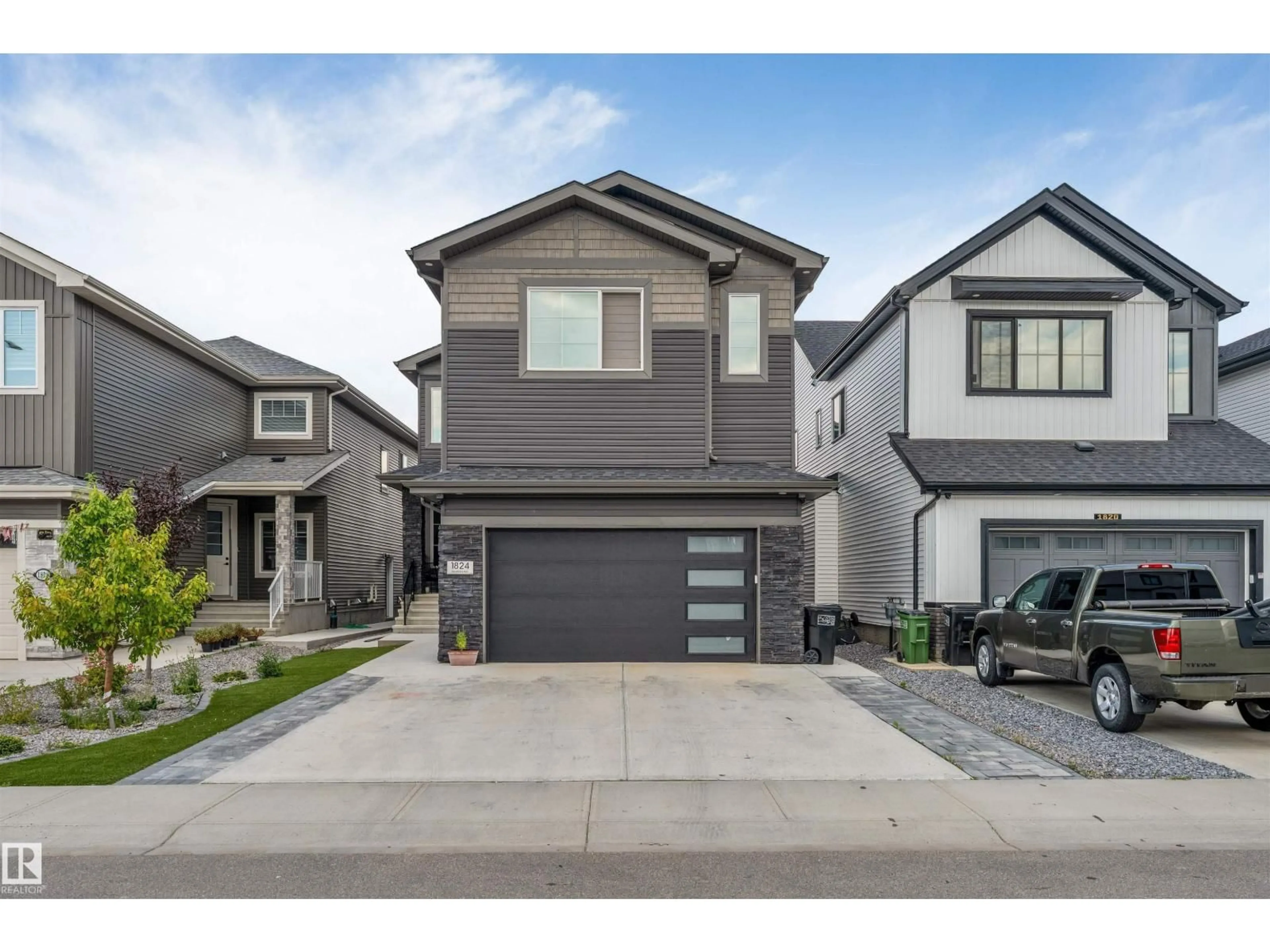 Home with vinyl exterior material, street for 1824 18 AV, Edmonton Alberta T6T2N1