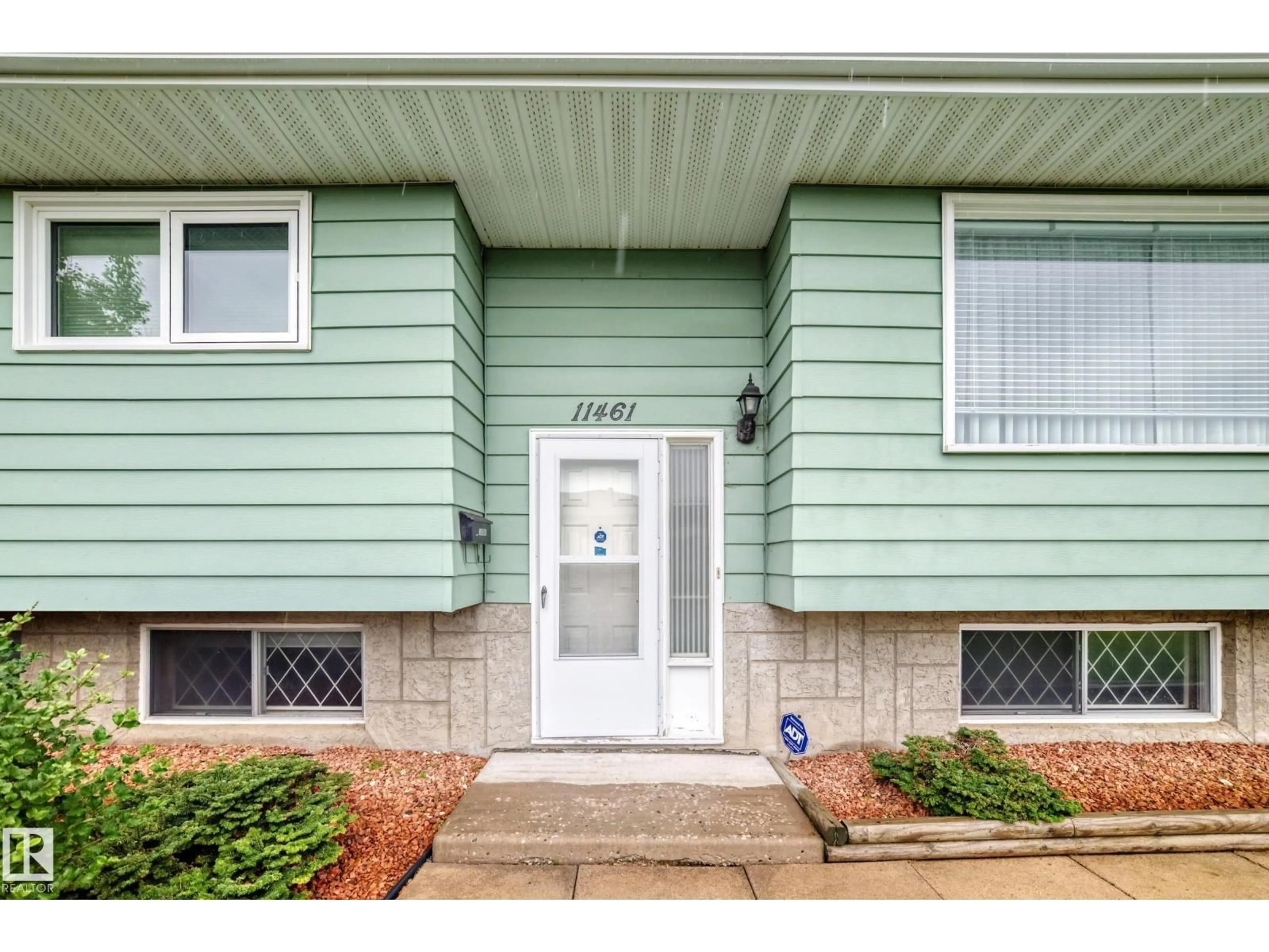 Home with vinyl exterior material, street for 11461 152A AV, Edmonton Alberta T5X1E3