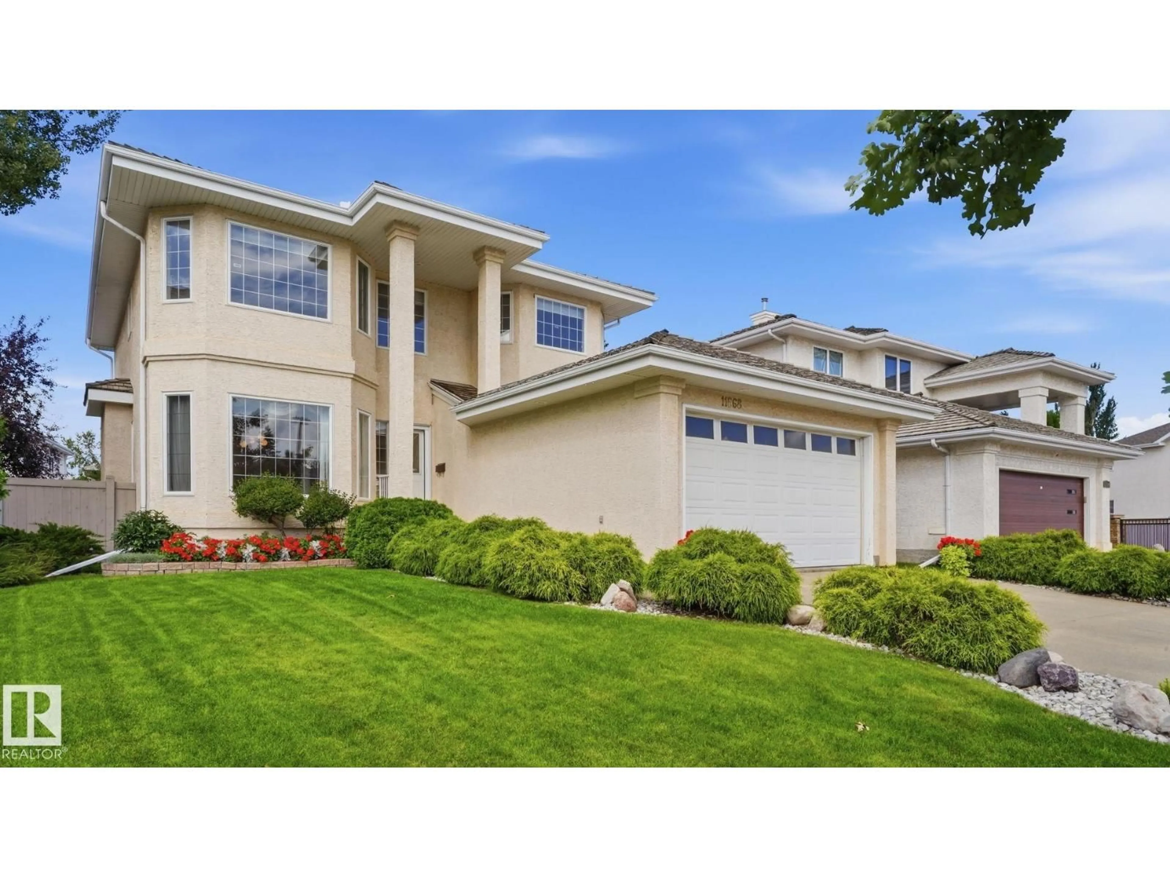 Home with vinyl exterior material, street for 11568 15 AV, Edmonton Alberta T6J7C9