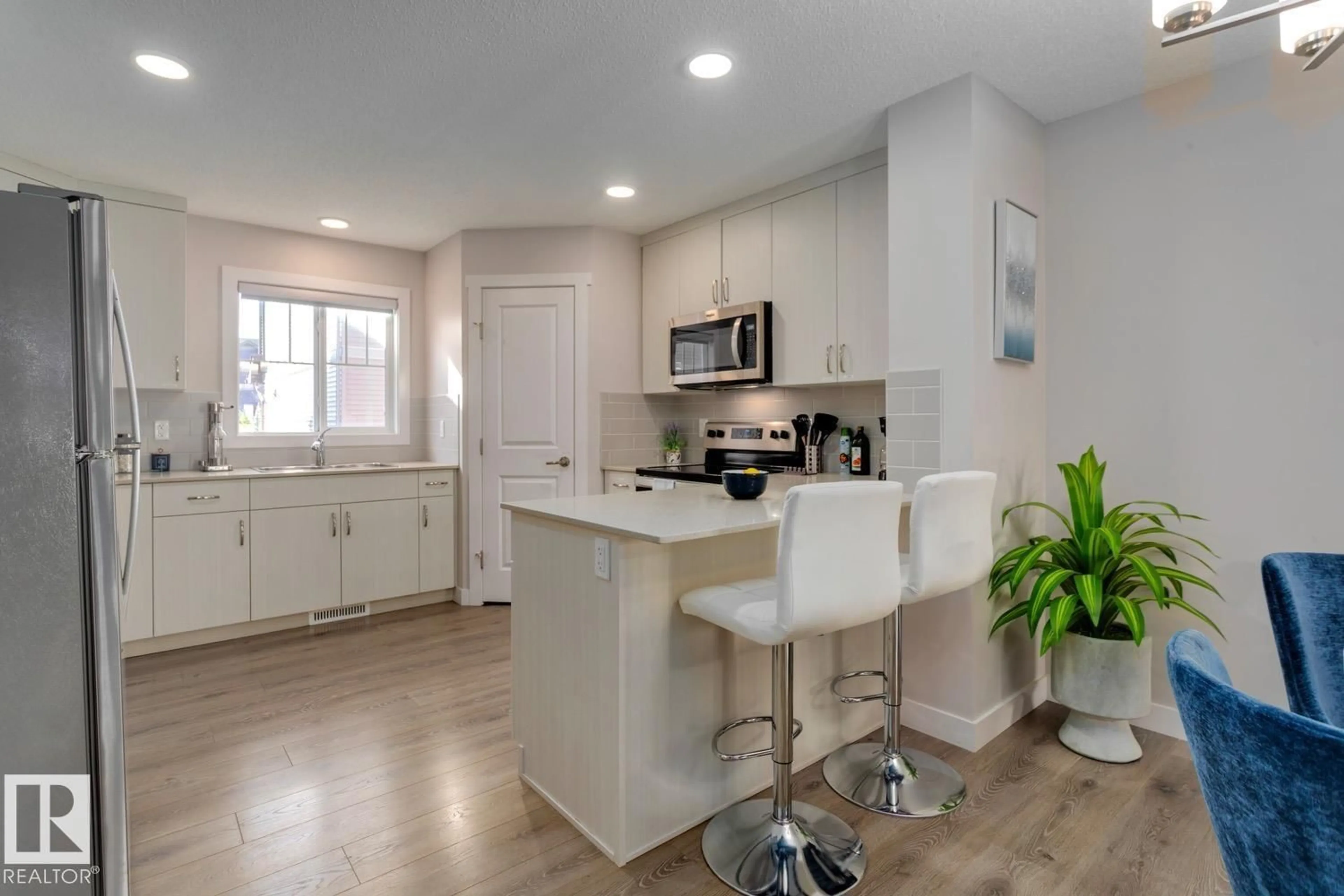 Open concept kitchen, unknown for 72 - 1005 GRAYDON HILL BV, Edmonton Alberta T6W3J5