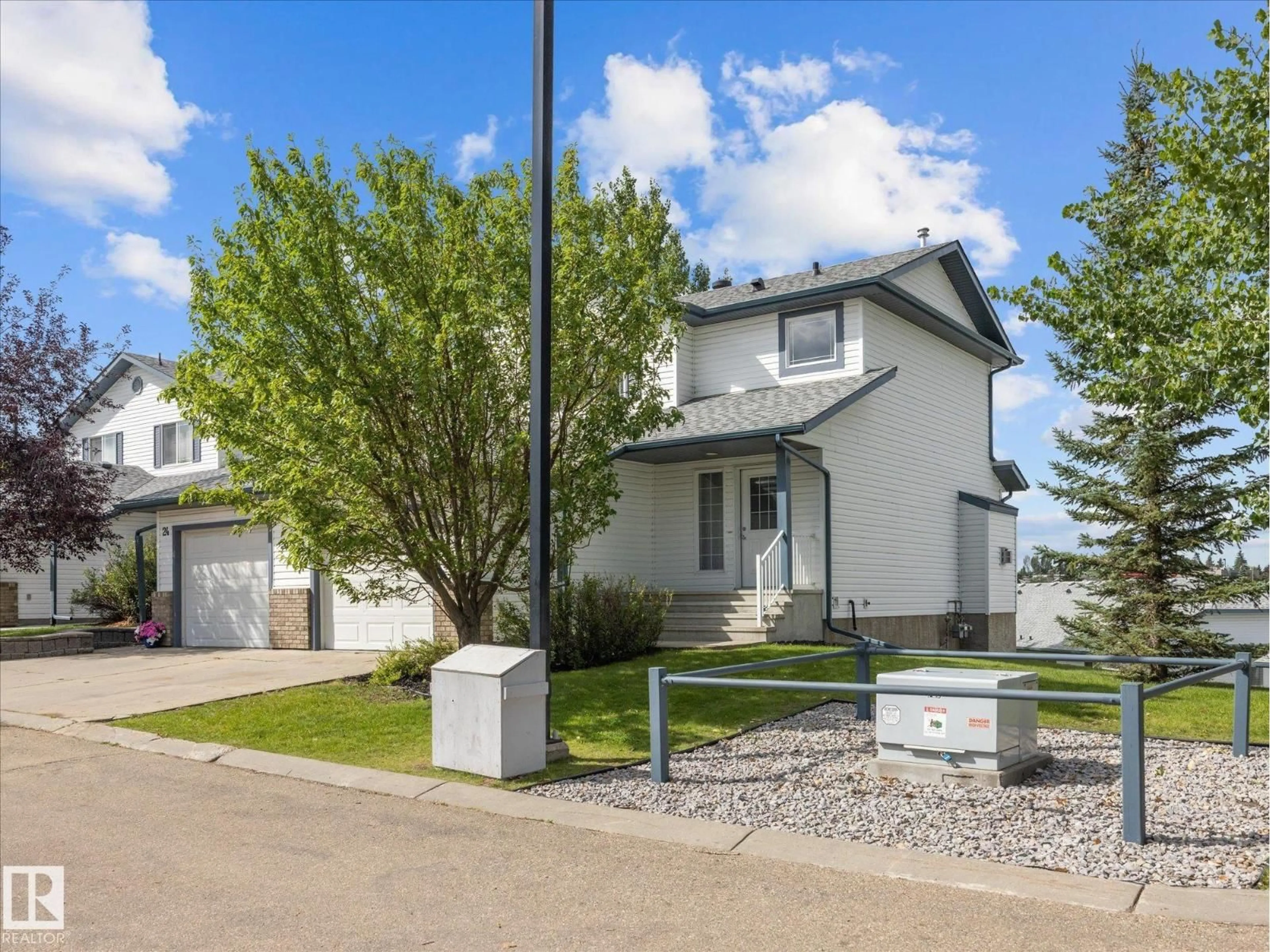 Home with vinyl exterior material, street for #23 - 450 HYNDMAN CR, Edmonton Alberta T5A0E2