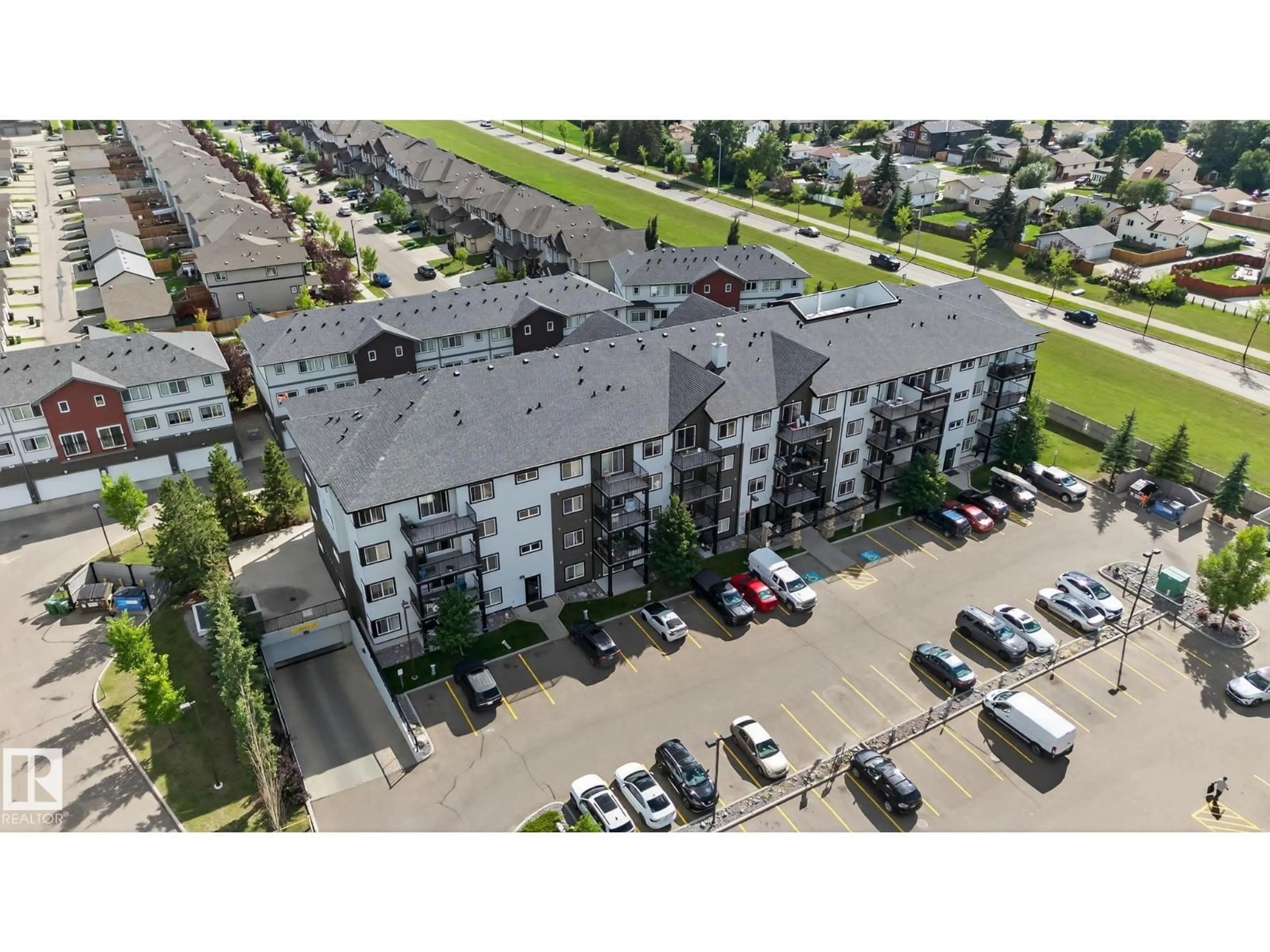 A pic from outside/outdoor area/front of a property/back of a property/a pic from drone, unknown for 3353 16A AV, Edmonton Alberta T6T0V4