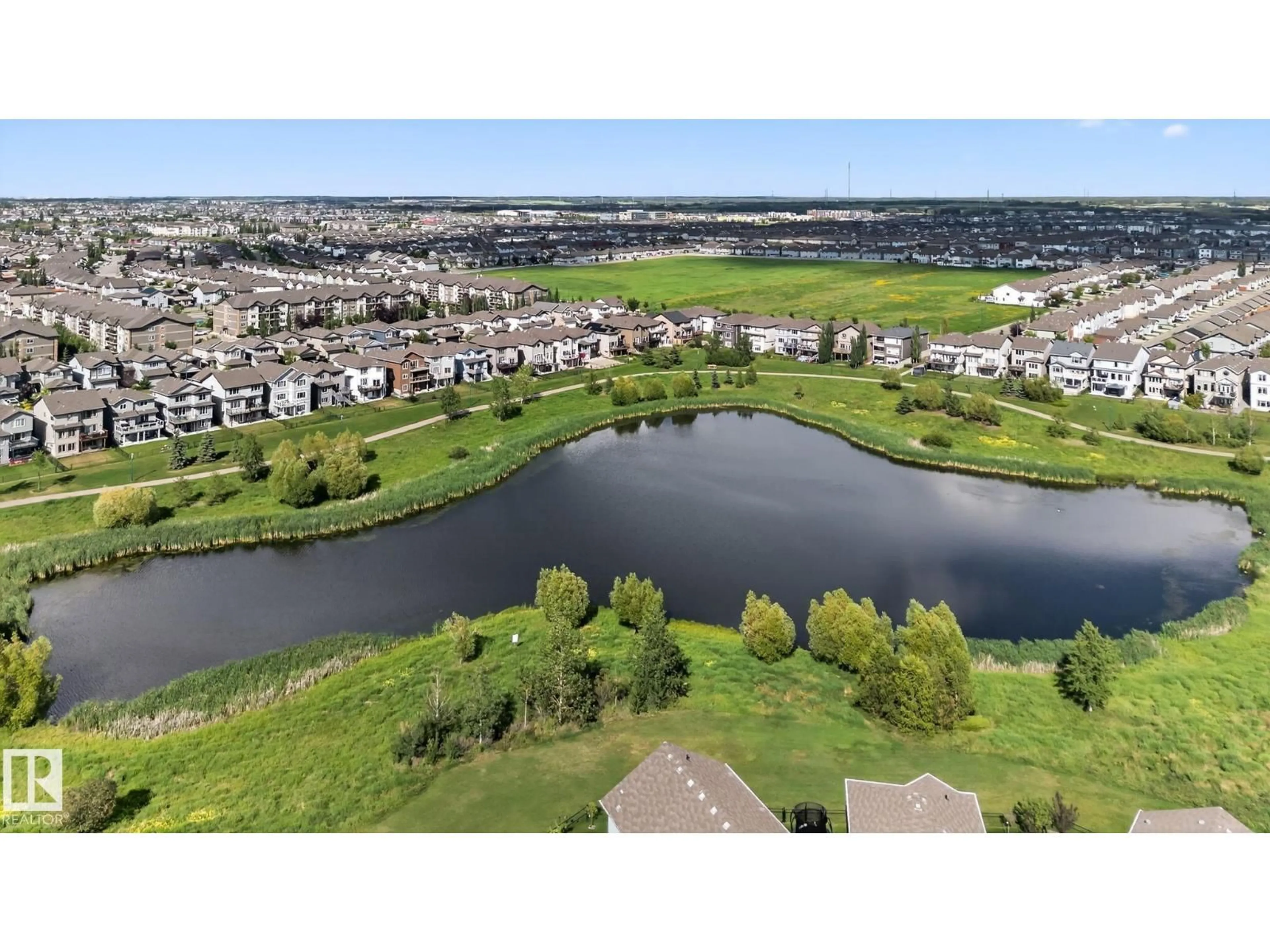 A pic from outside/outdoor area/front of a property/back of a property/a pic from drone, water/lake/river/ocean view for 3353 16A AV, Edmonton Alberta T6T0V4
