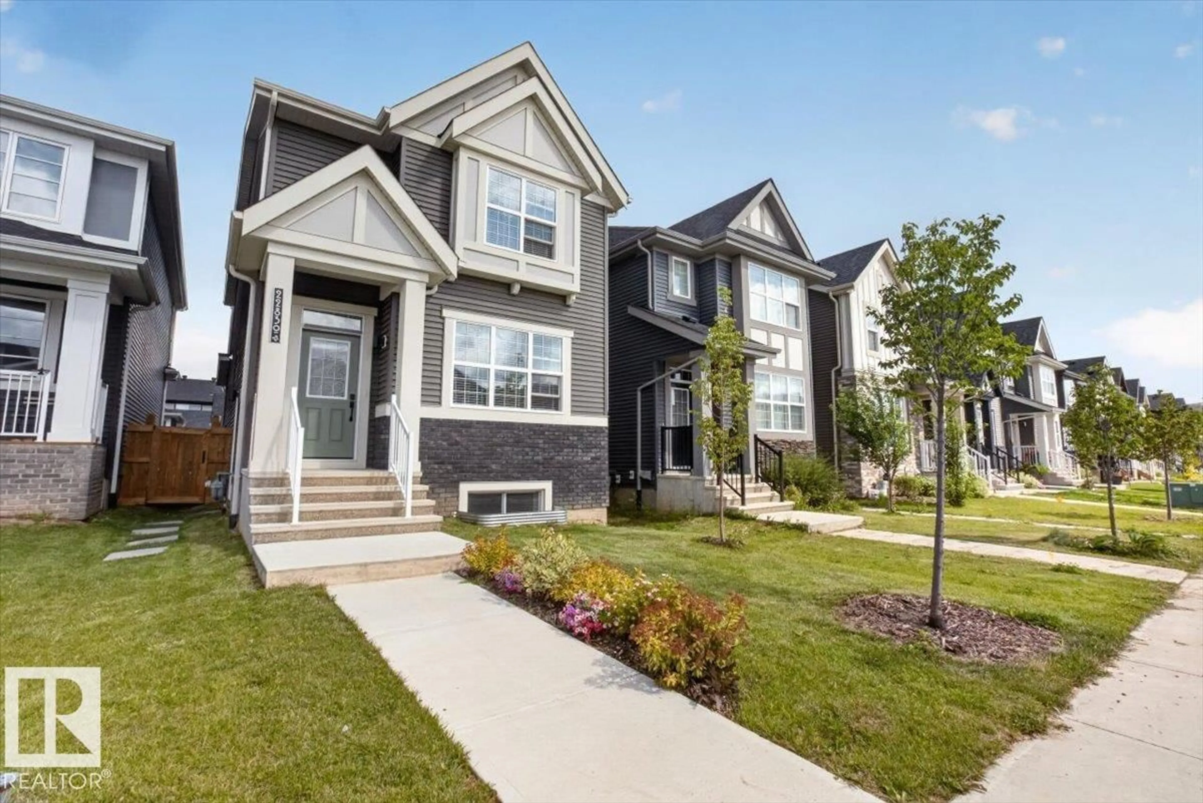 Home with vinyl exterior material, street for 22830 82A AV, Edmonton Alberta T5T4H5