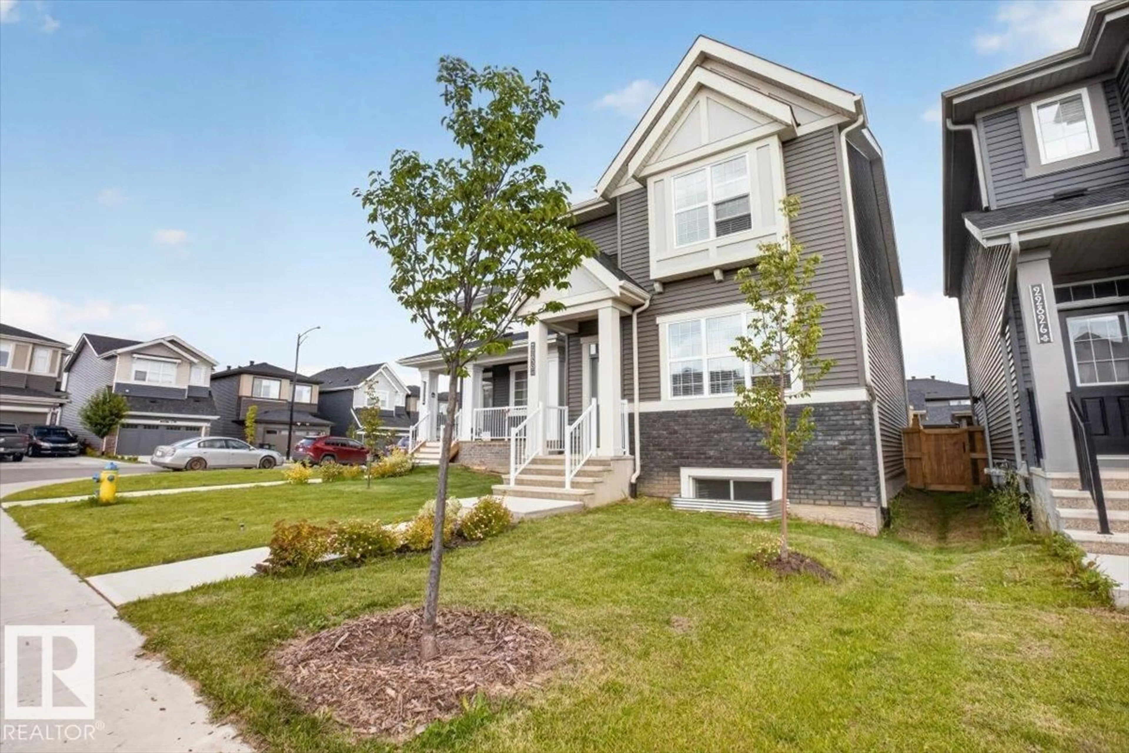 Home with vinyl exterior material, street for 22830 82A AV, Edmonton Alberta T5T4H5