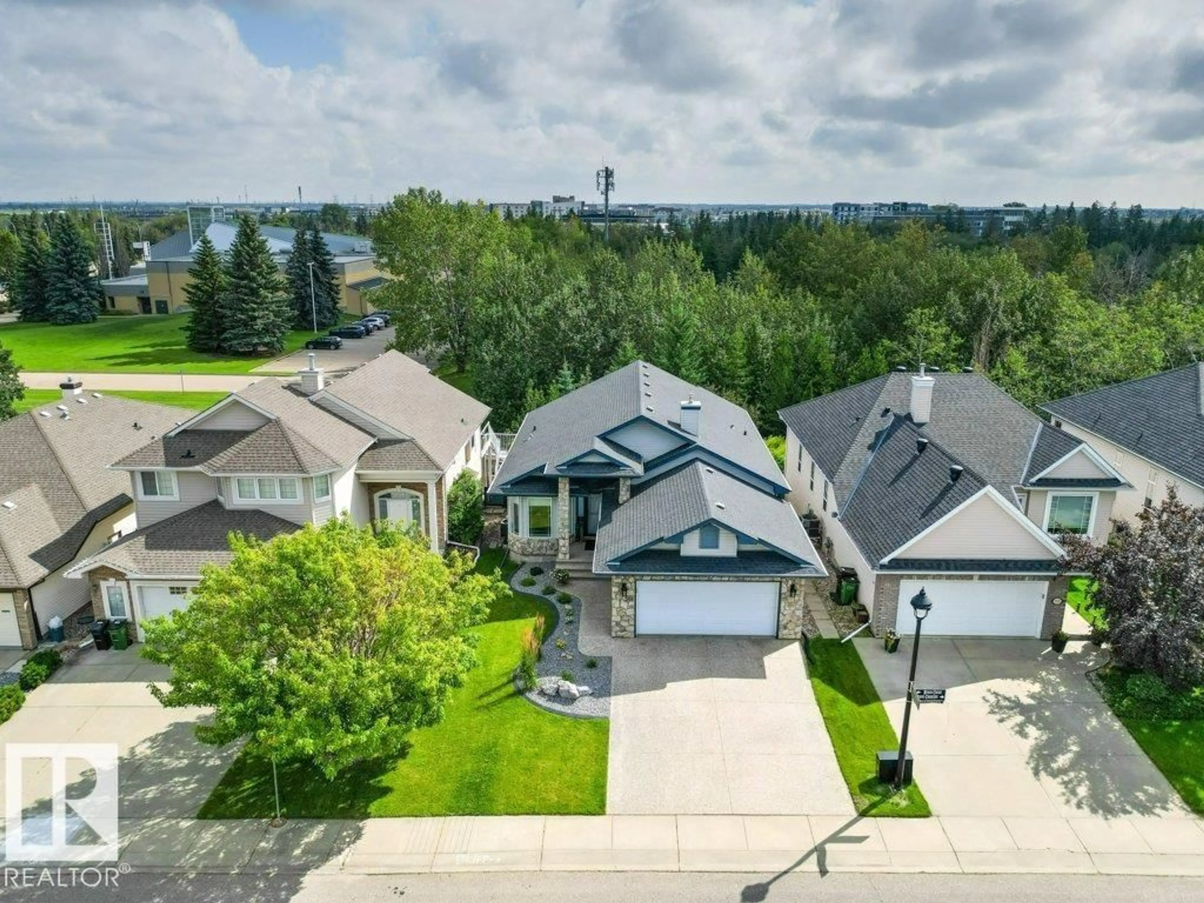 A pic from outside/outdoor area/front of a property/back of a property/a pic from drone, street for 501 BYRNE CR, Edmonton Alberta T6W1E2