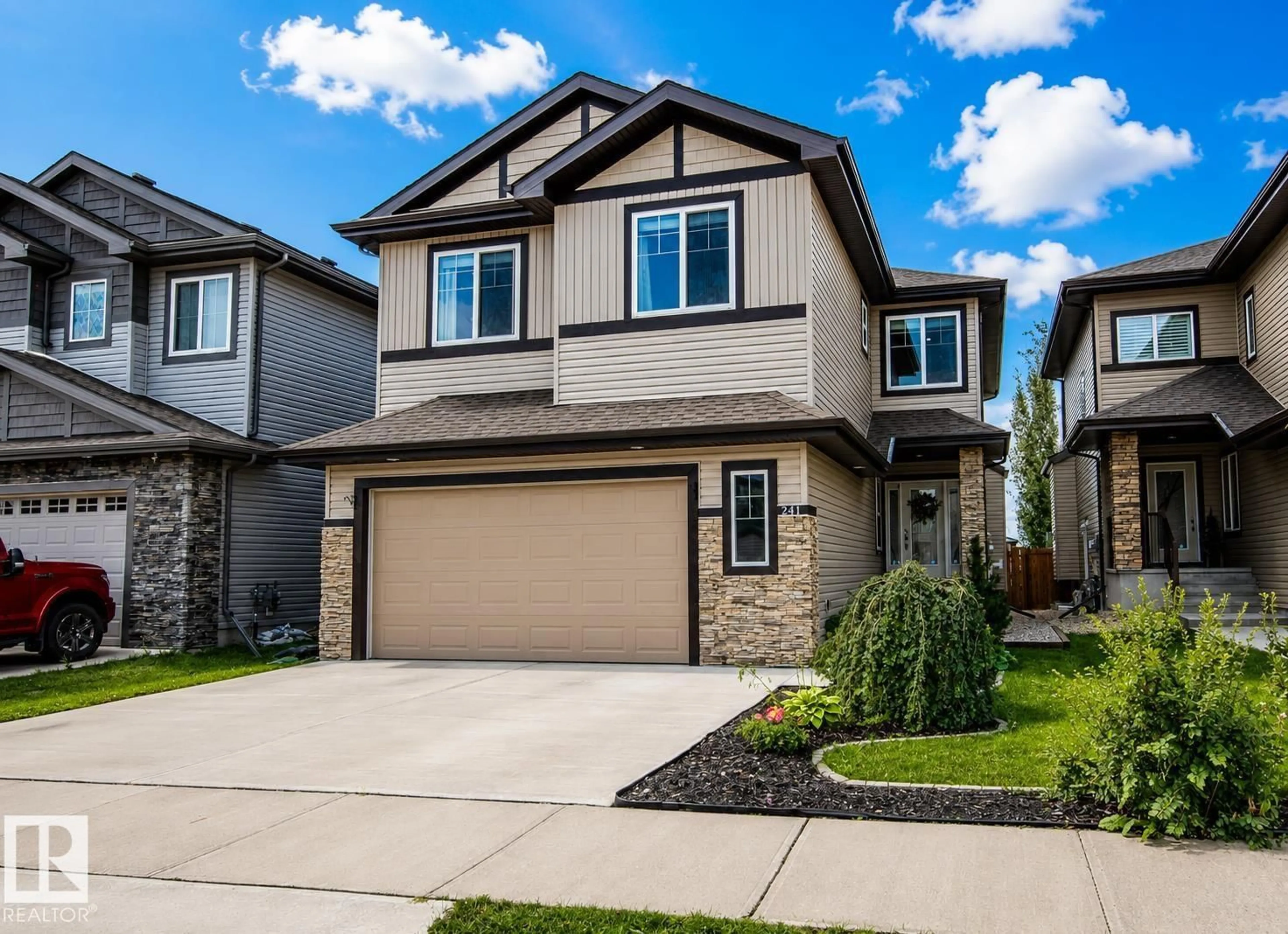 Home with vinyl exterior material, street for 241 WESTBROOK WD, Fort Saskatchewan Alberta T8L0L6