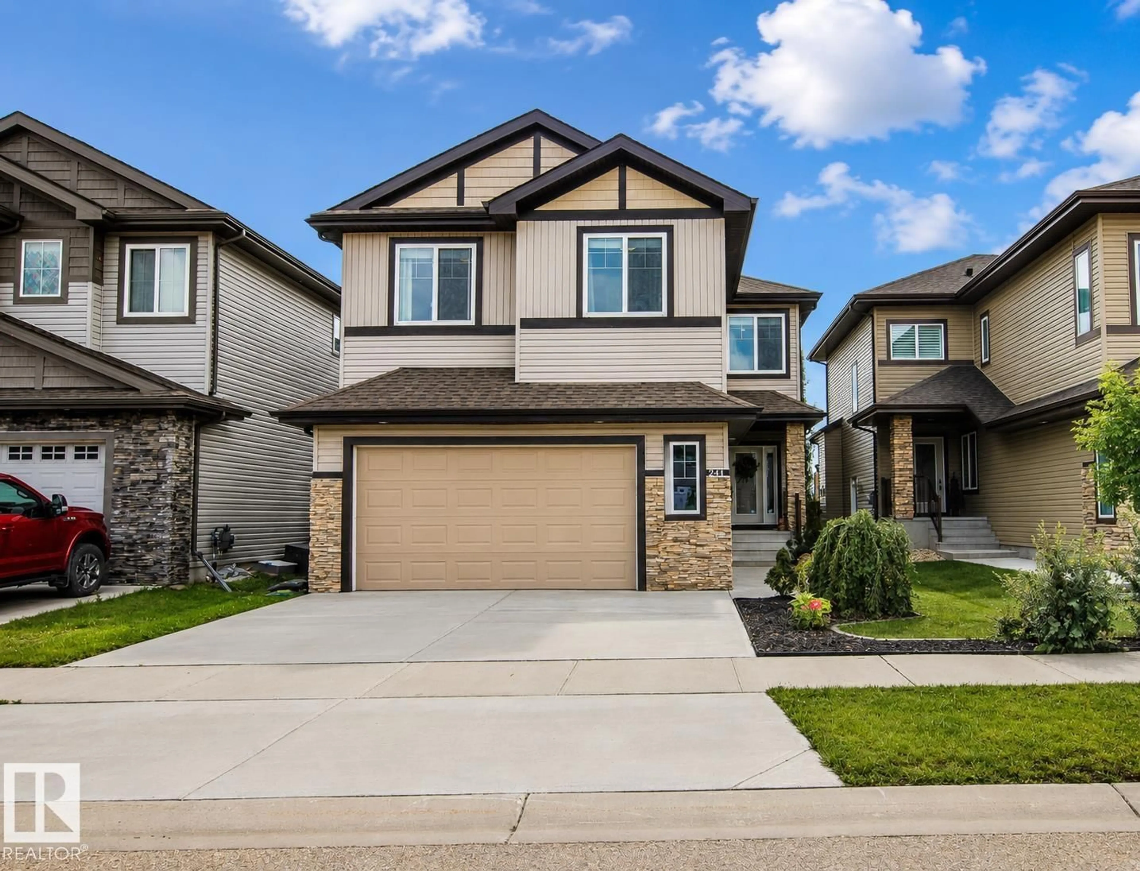 Home with vinyl exterior material, street for 241 WESTBROOK WD, Fort Saskatchewan Alberta T8L0L6