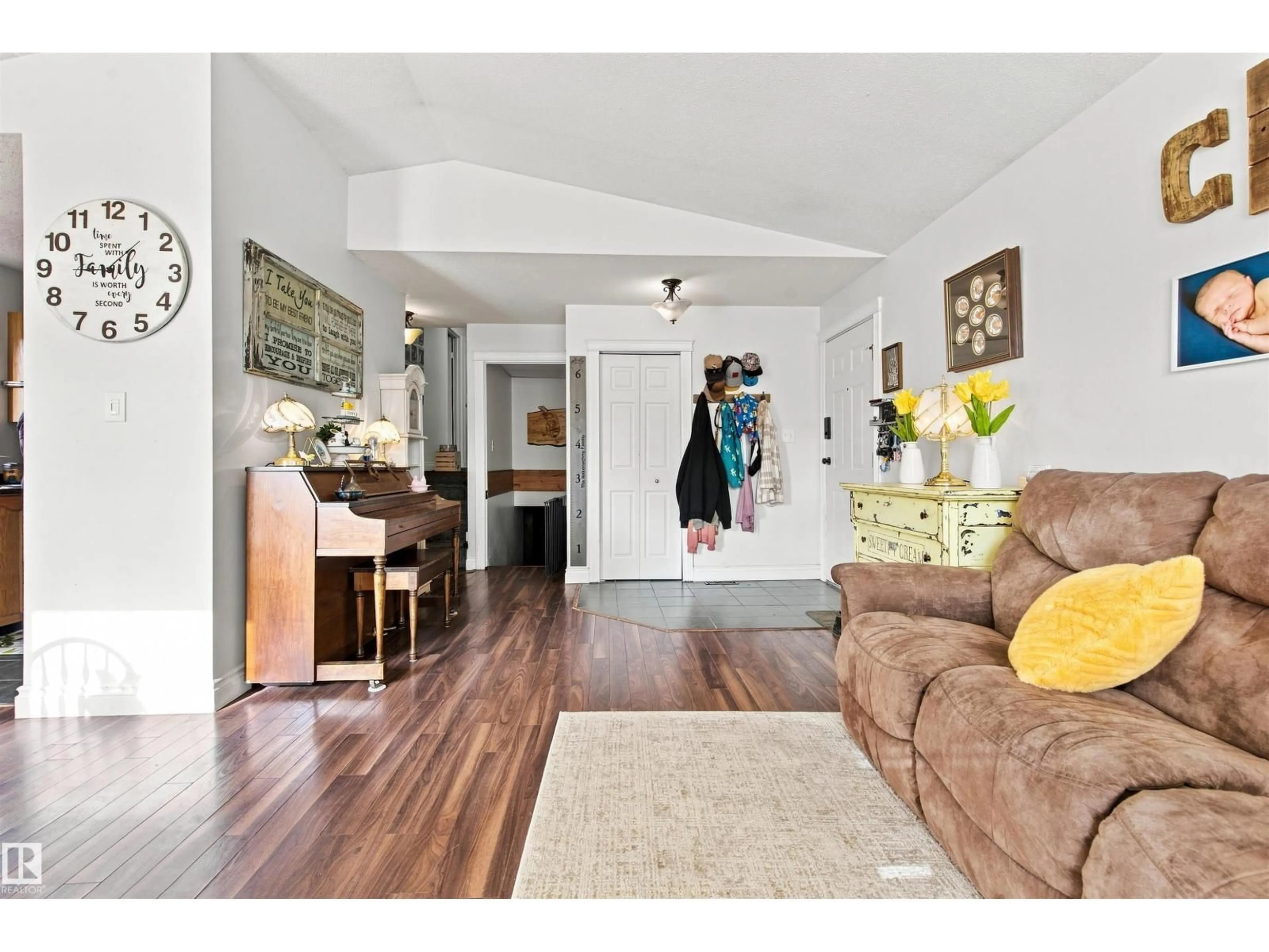 Living room with furniture, wood/laminate floor for 301 22 ST, Cold Lake Alberta T9M1E8