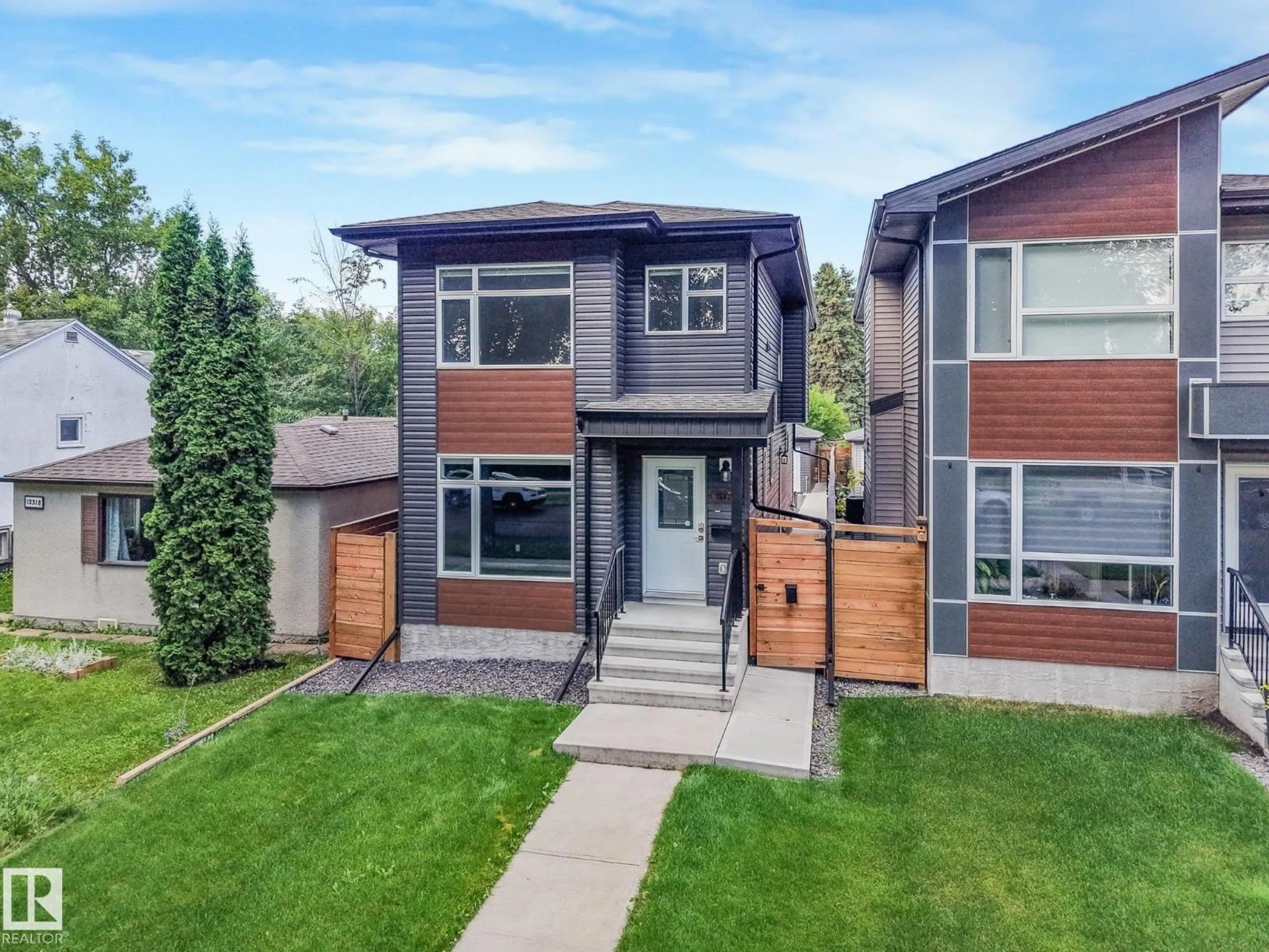 Home with brick exterior material, street for NW - 12322 101 ST, Edmonton Alberta T5G2C7