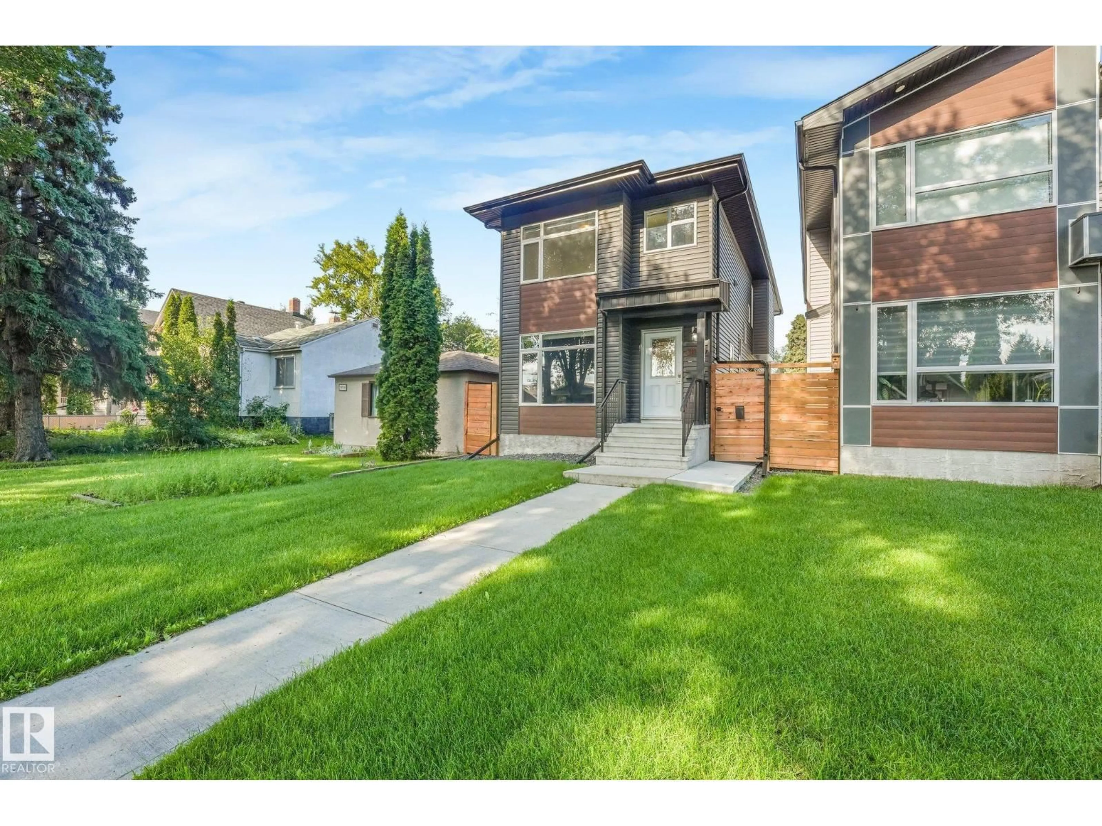 Home with brick exterior material, street for NW - 12322 101 ST, Edmonton Alberta T5G2C7