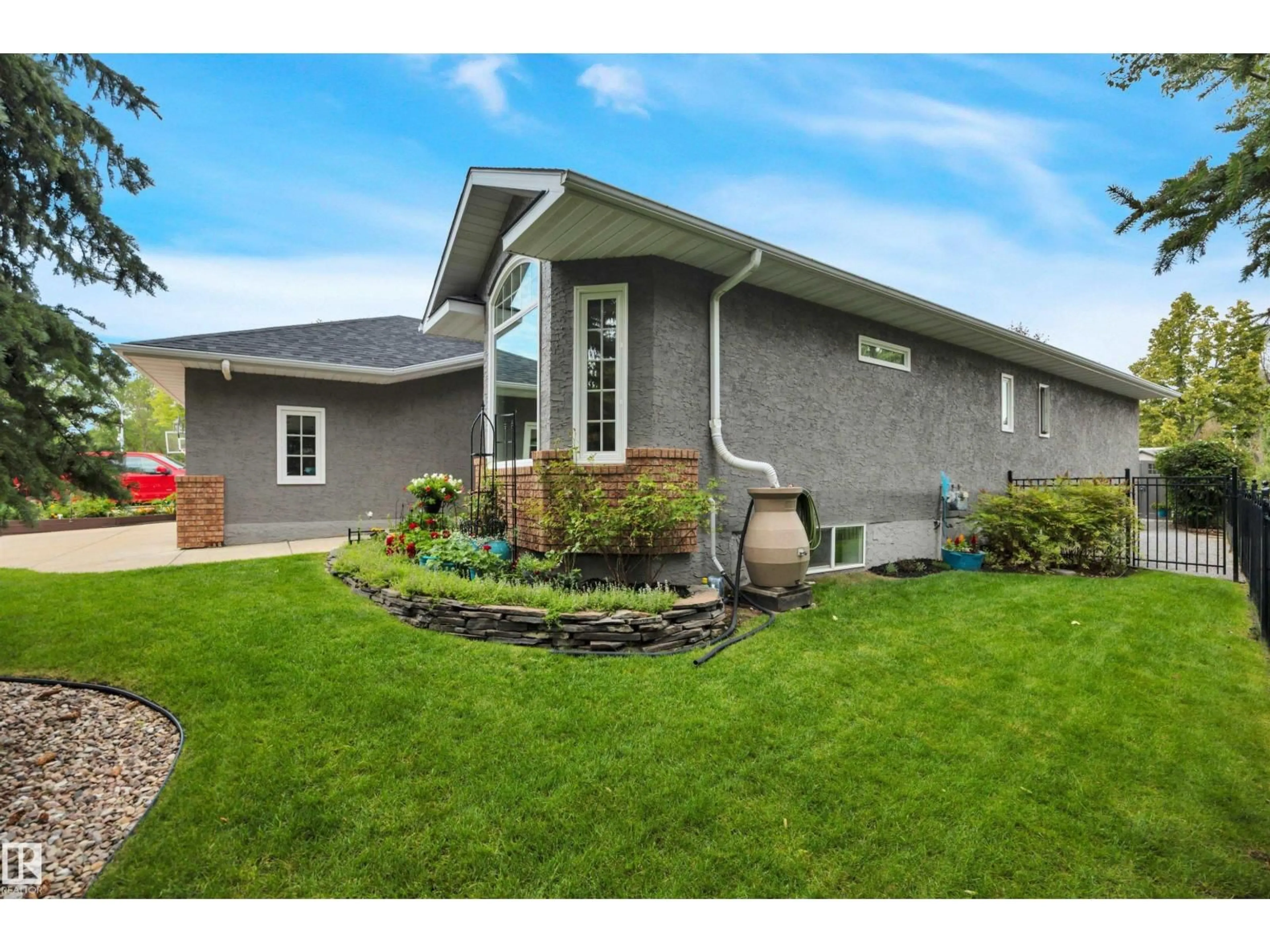 Home with vinyl exterior material, street for 341 BURTON RD, Edmonton Alberta T6R2J1