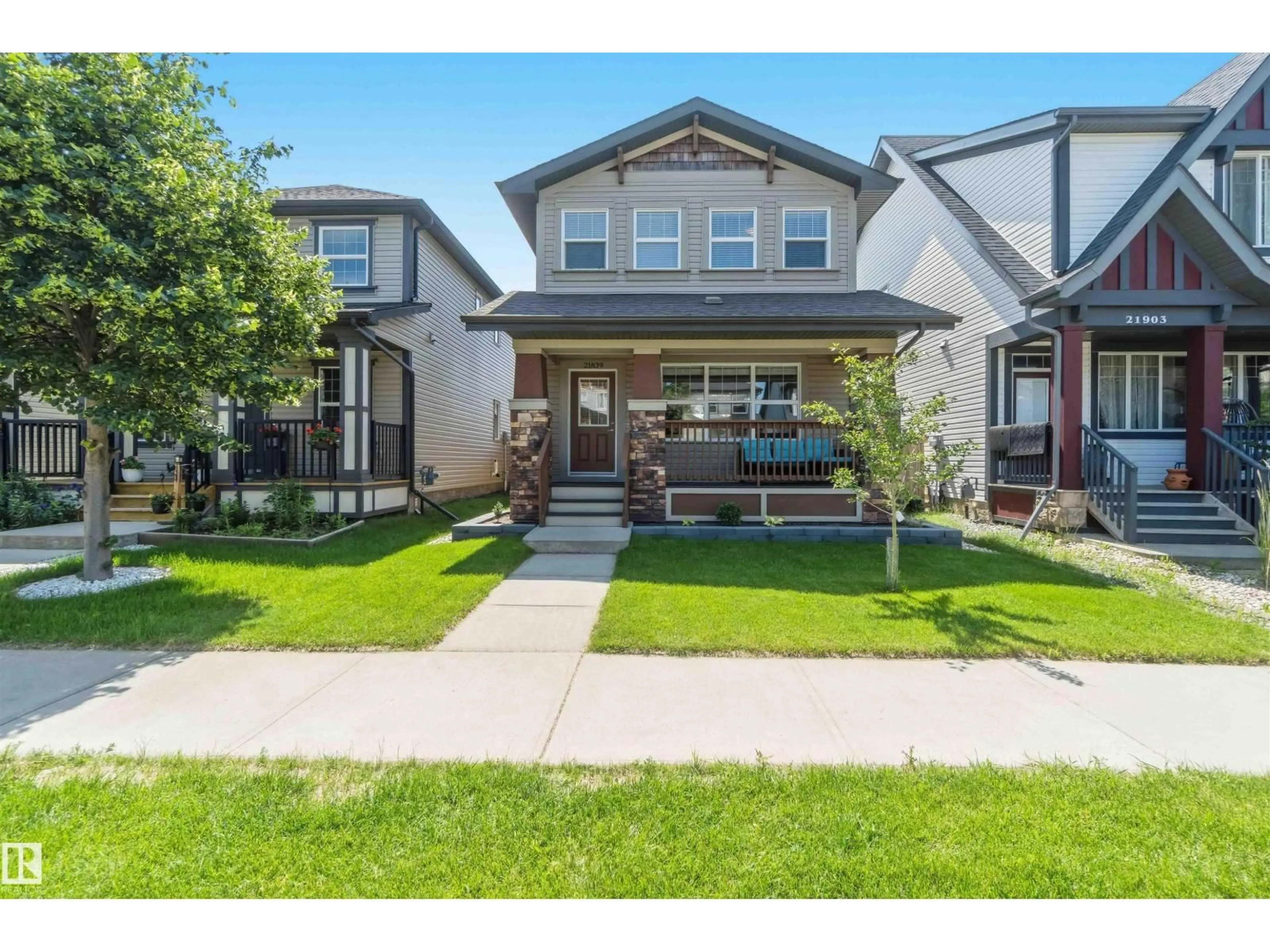 Home with vinyl exterior material, street for 21839 99 AV, Edmonton Alberta T5T4M5
