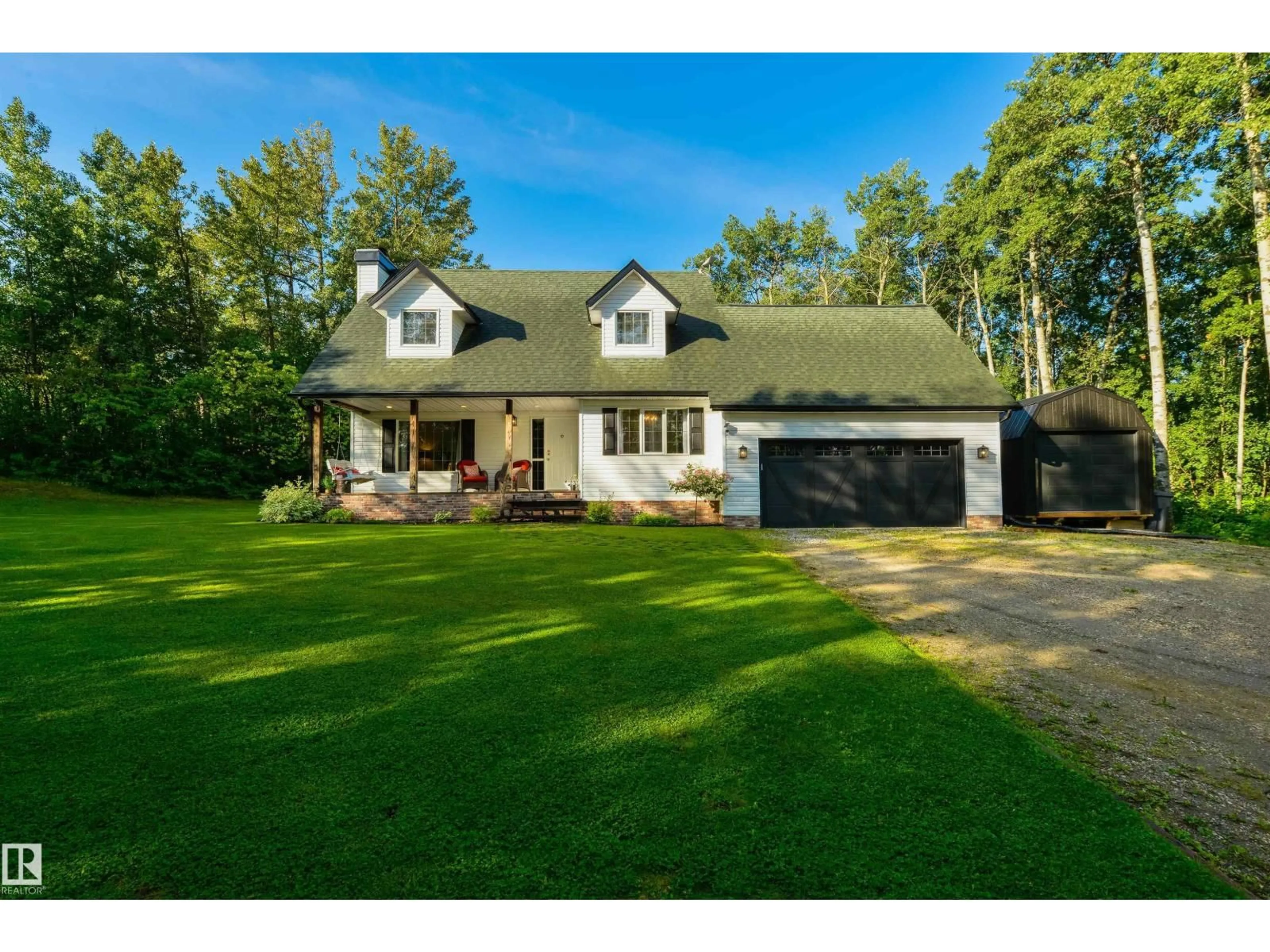 A pic from outside/outdoor area/front of a property/back of a property/a pic from drone, unknown for 37 - 54129 RGE ROAD 275, Rural Parkland County Alberta T7X3S4
