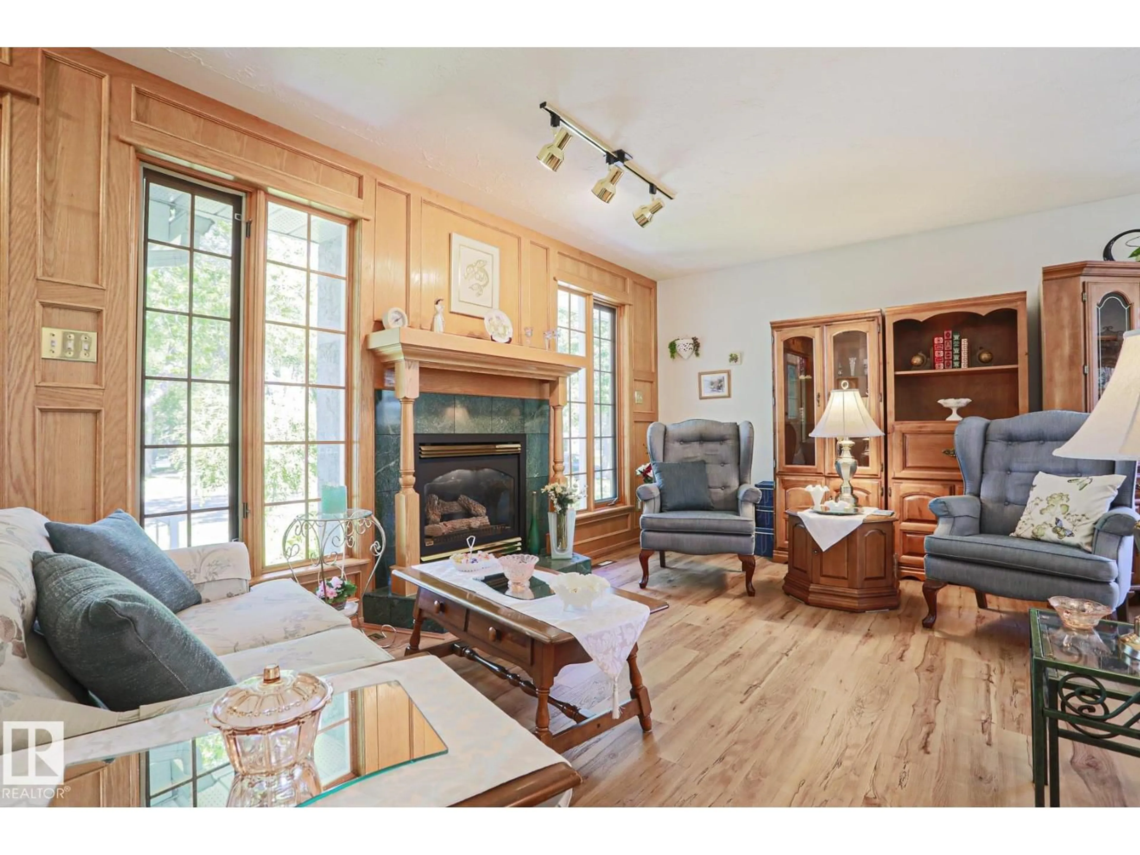Living room with furniture, wood/laminate floor for 77 SUNSET BV, St. Albert Alberta T8N0P2