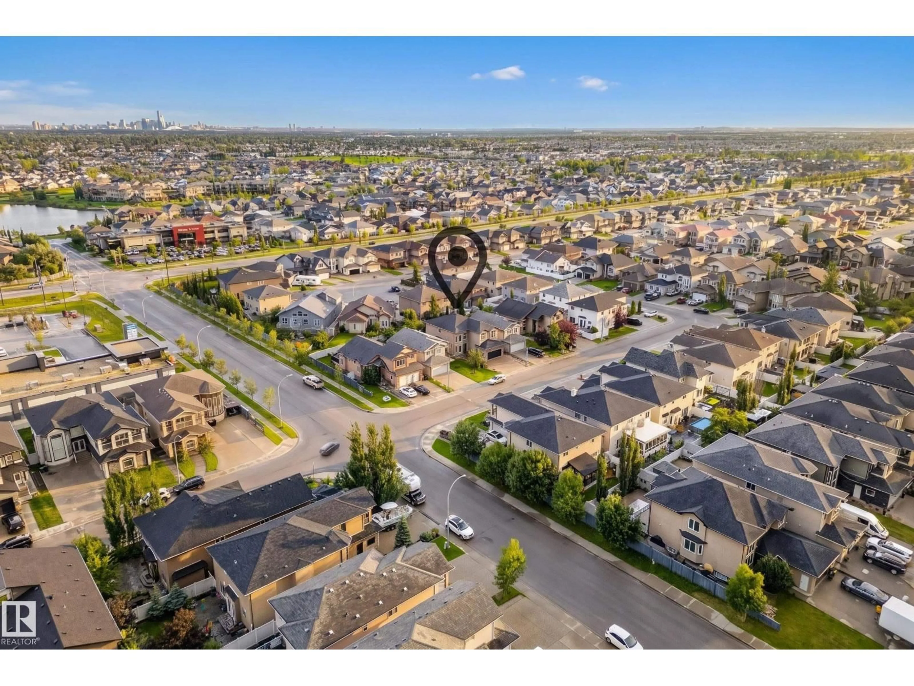 A pic from outside/outdoor area/front of a property/back of a property/a pic from drone, street for NW - 7111 169 AV, Edmonton Alberta T5Z0B5