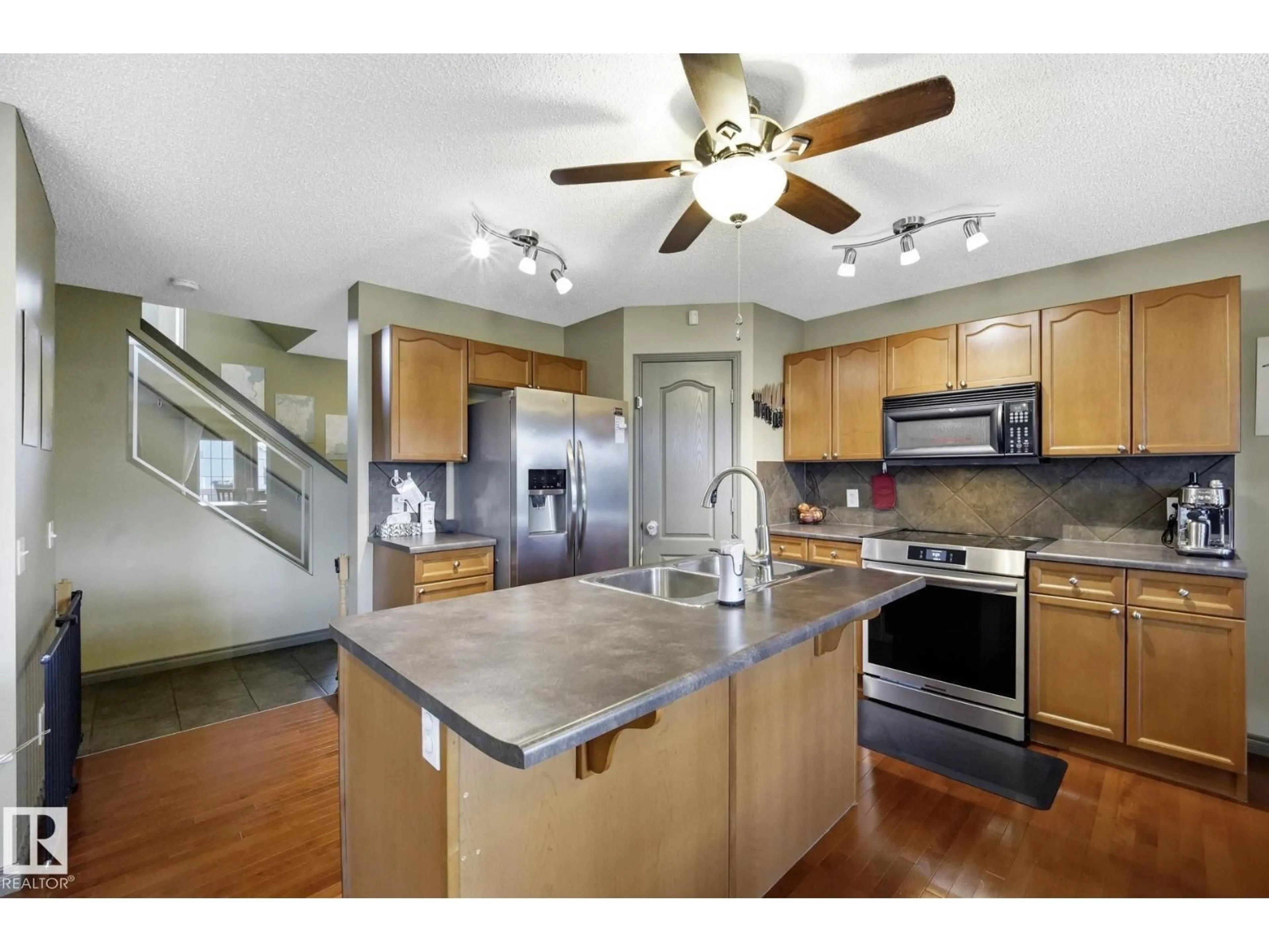 Open concept kitchen, ceramic/tile floor for NW - 5420 162B AV, Edmonton Alberta T5Y6K5