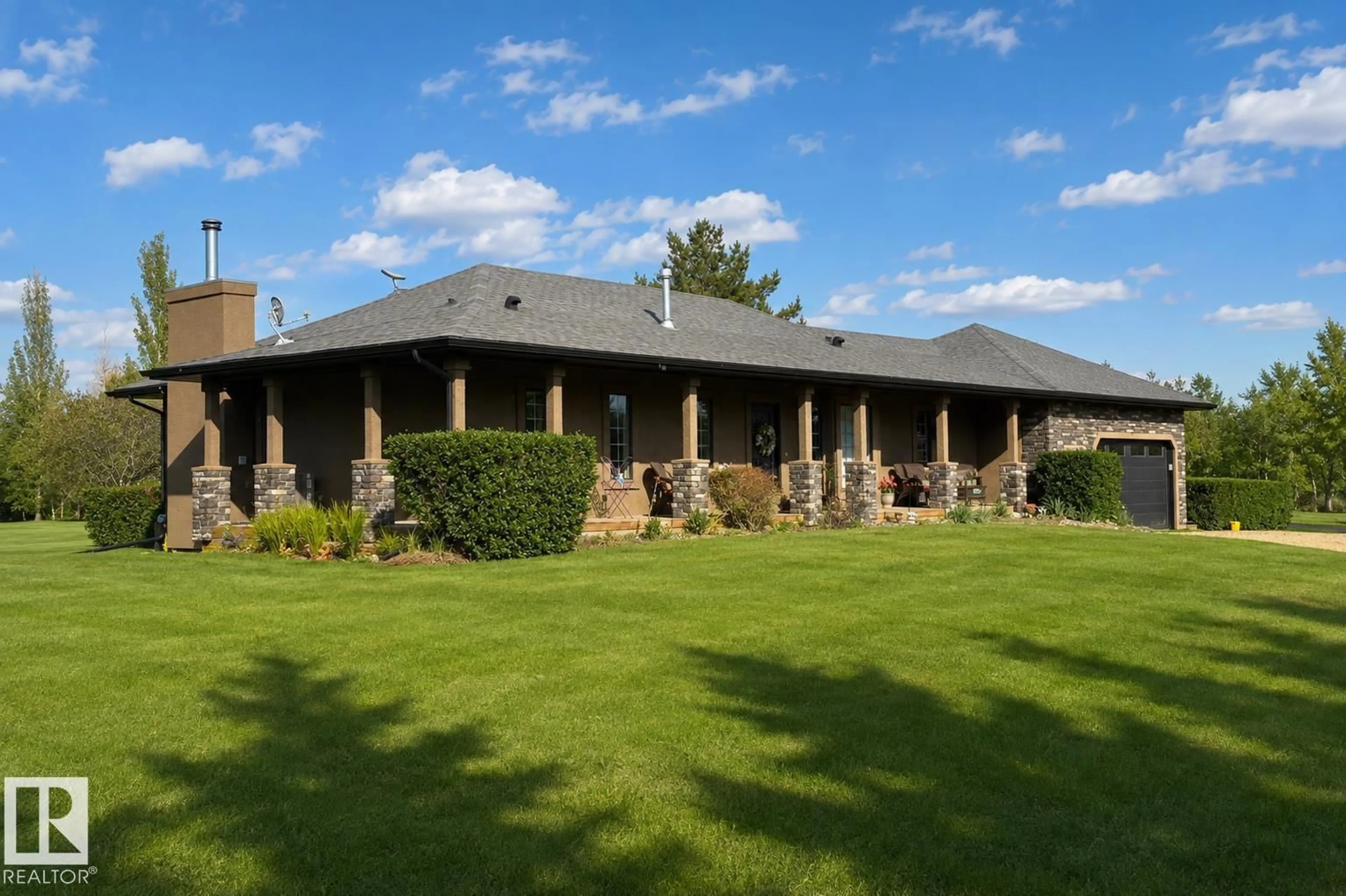 A pic from outside/outdoor area/front of a property/back of a property/a pic from drone, building for 56407 RGE ROAD 240, Rural Sturgeon County Alberta T0A0K2