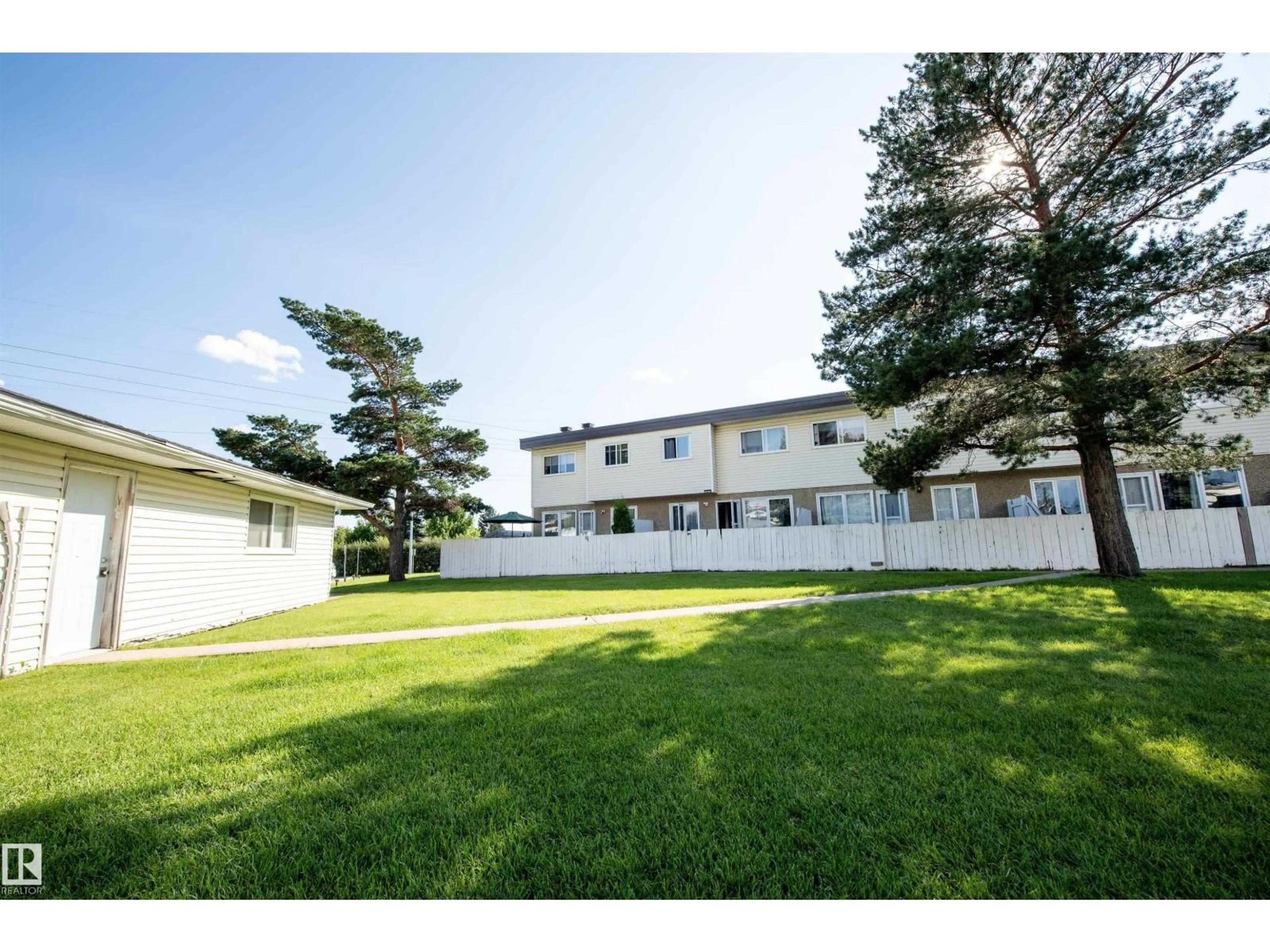 A pic from outside/outdoor area/front of a property/back of a property/a pic from drone, building for 118 - 16344 109 ST, Edmonton Alberta T5X2T4