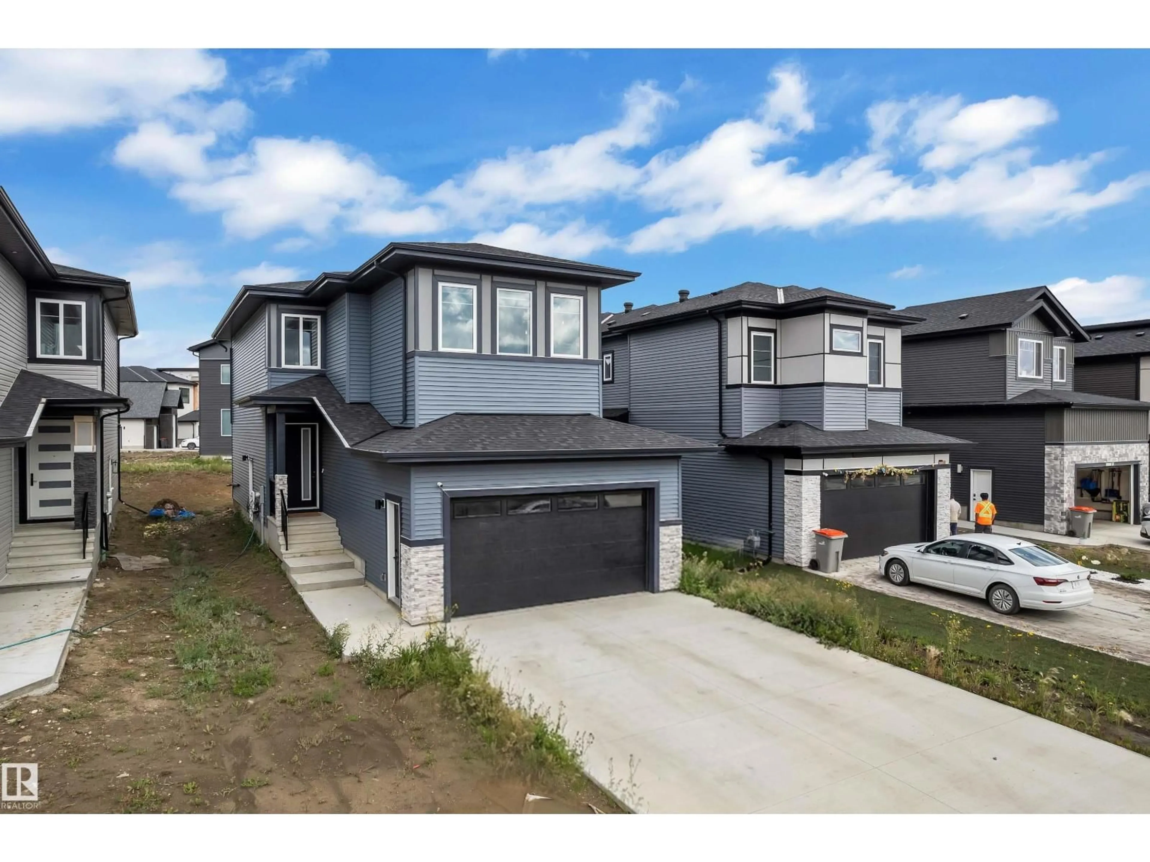 Home with vinyl exterior material, street for 5919 17 ST, Rural Leduc County Alberta T4X3C6