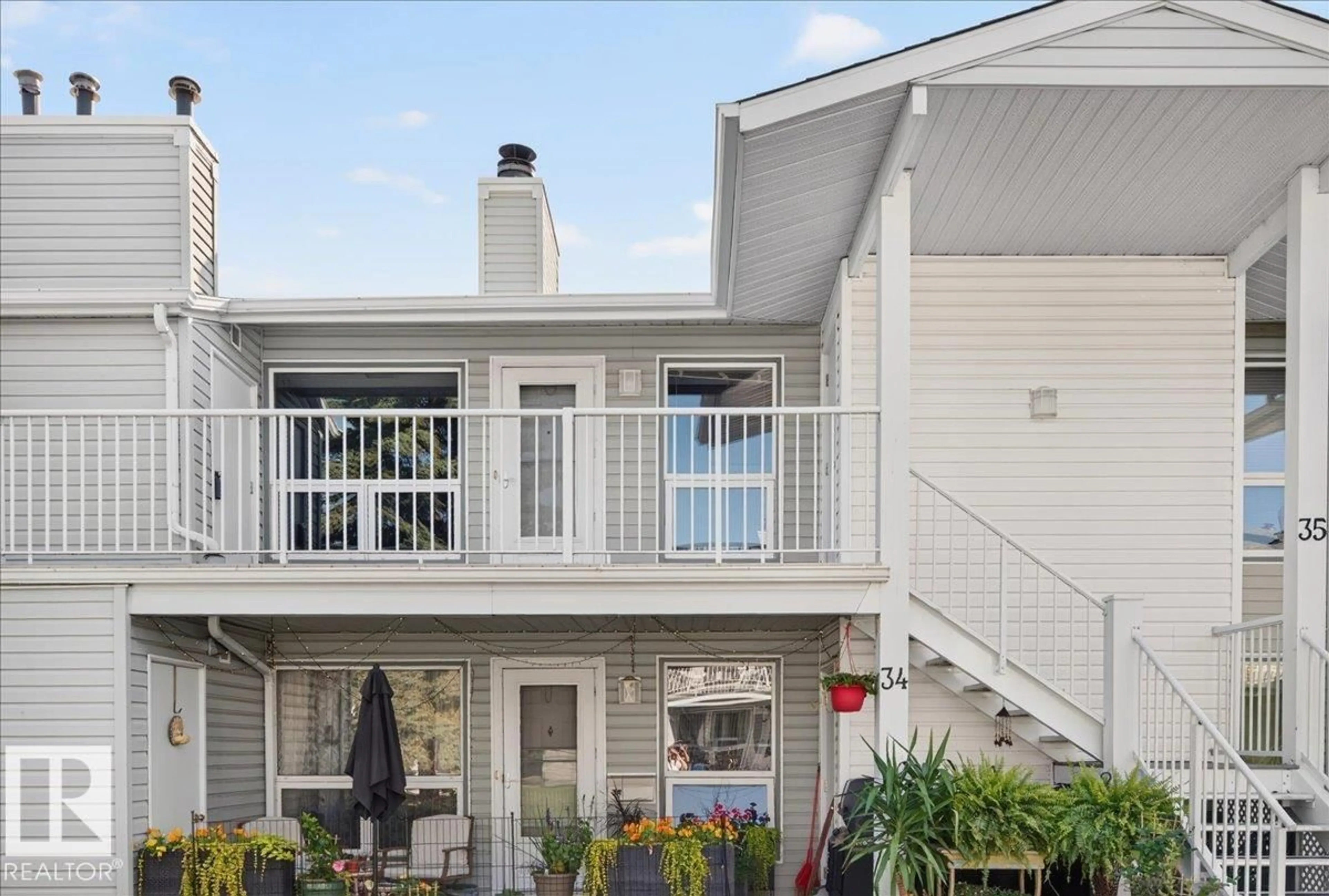 Home with vinyl exterior material, street for #35 - 2115 118 ST NW, Edmonton Alberta T6J5N1
