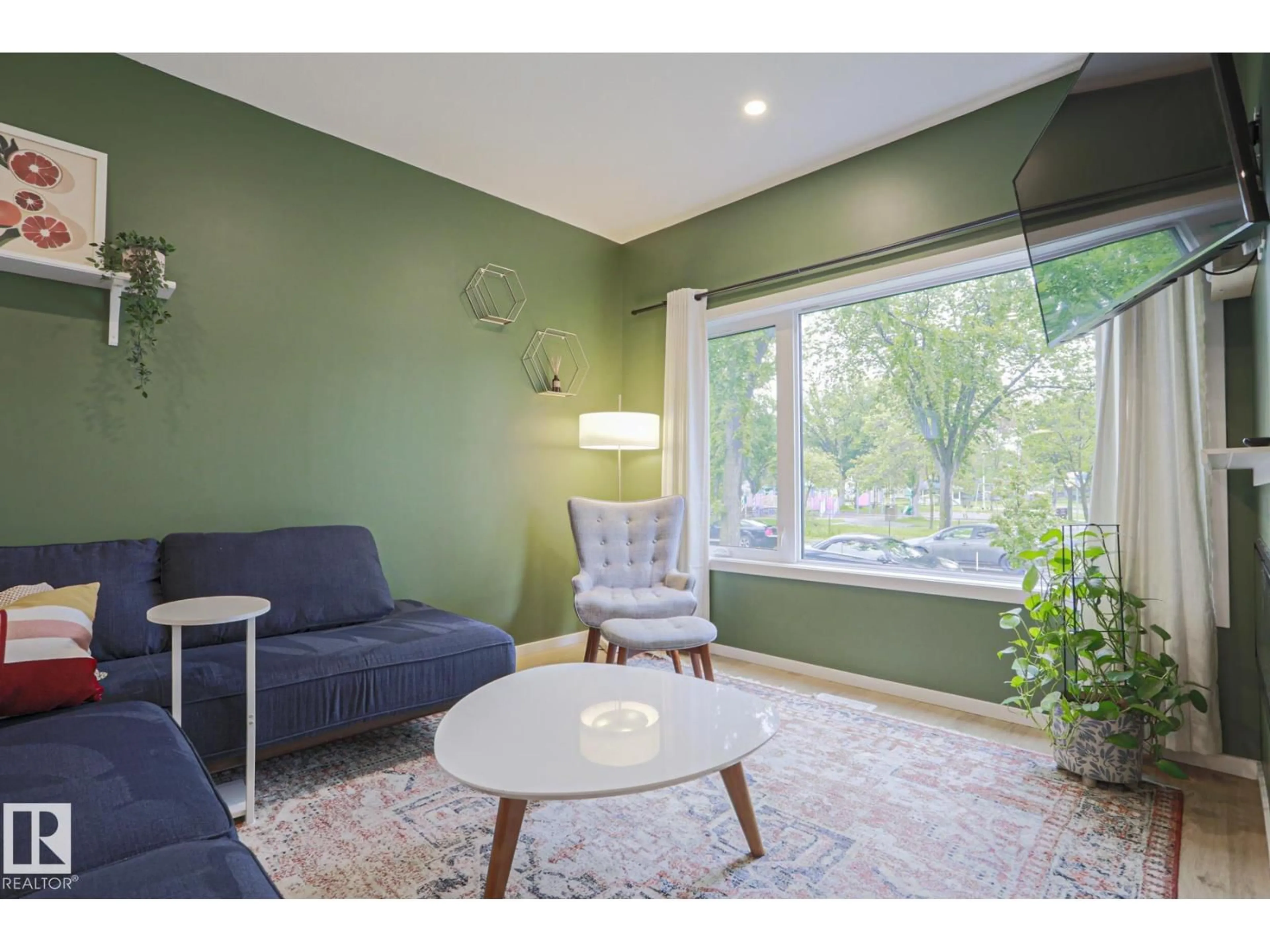 Living room with furniture, unknown for 12020 125 ST NW, Edmonton Alberta T5L0S4