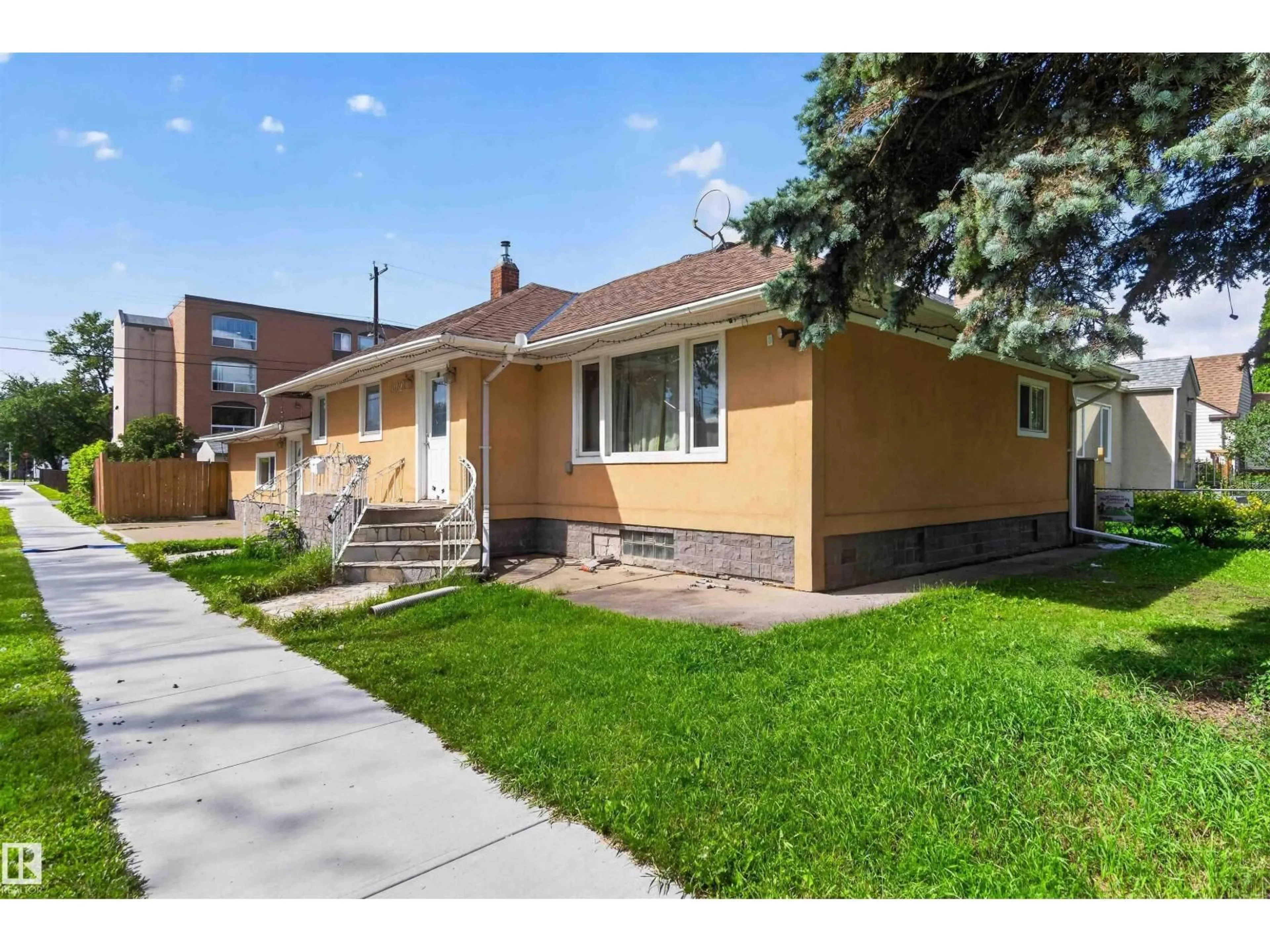 Home with brick exterior material, street for NW - 9402 117 AVENUE, Edmonton Alberta T5G0M4