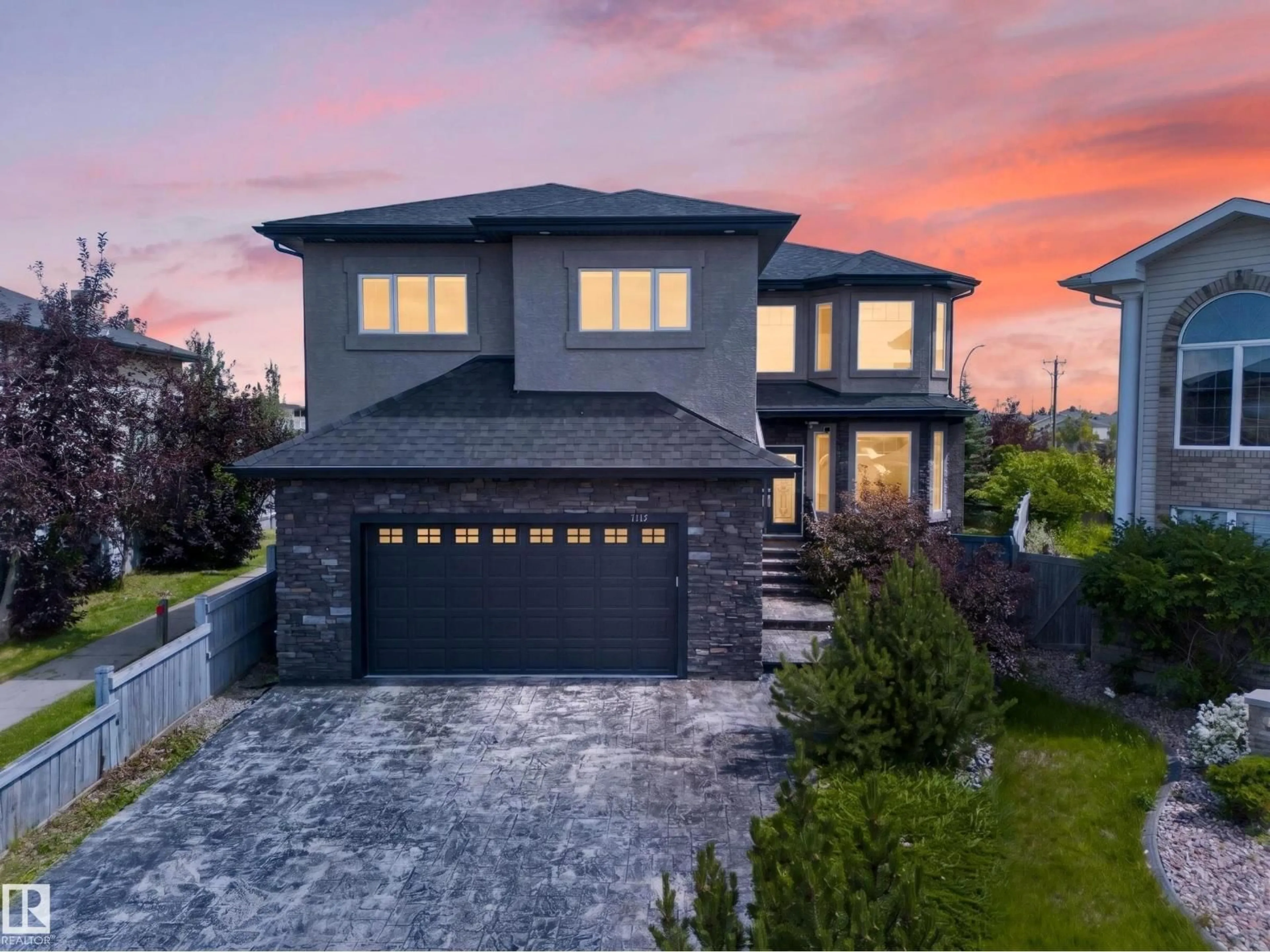 Home with brick exterior material, street for 7103 168 AV, Edmonton Alberta T5Z0B5