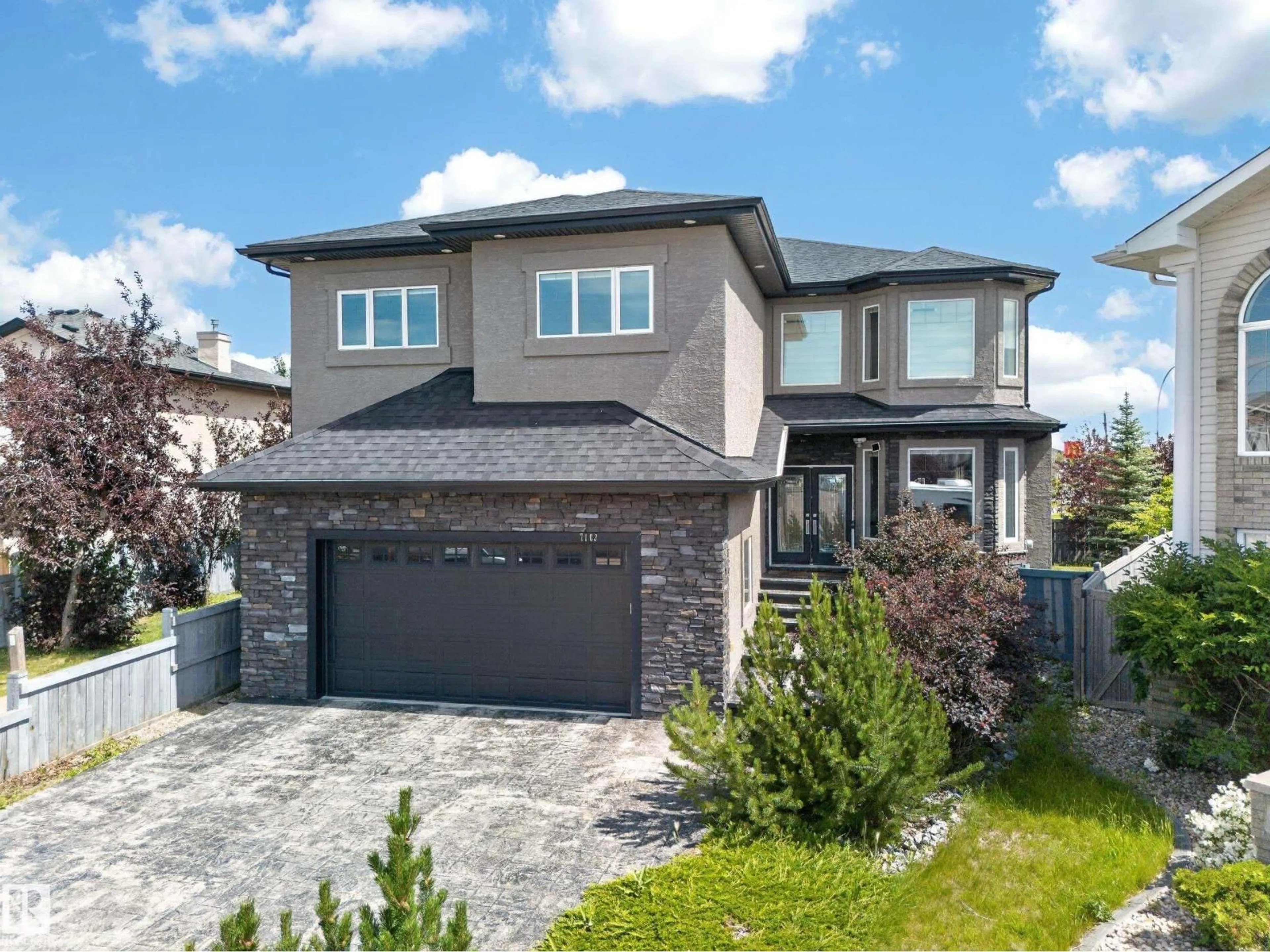 Home with brick exterior material, street for 7103 168 AV, Edmonton Alberta T5Z0B5