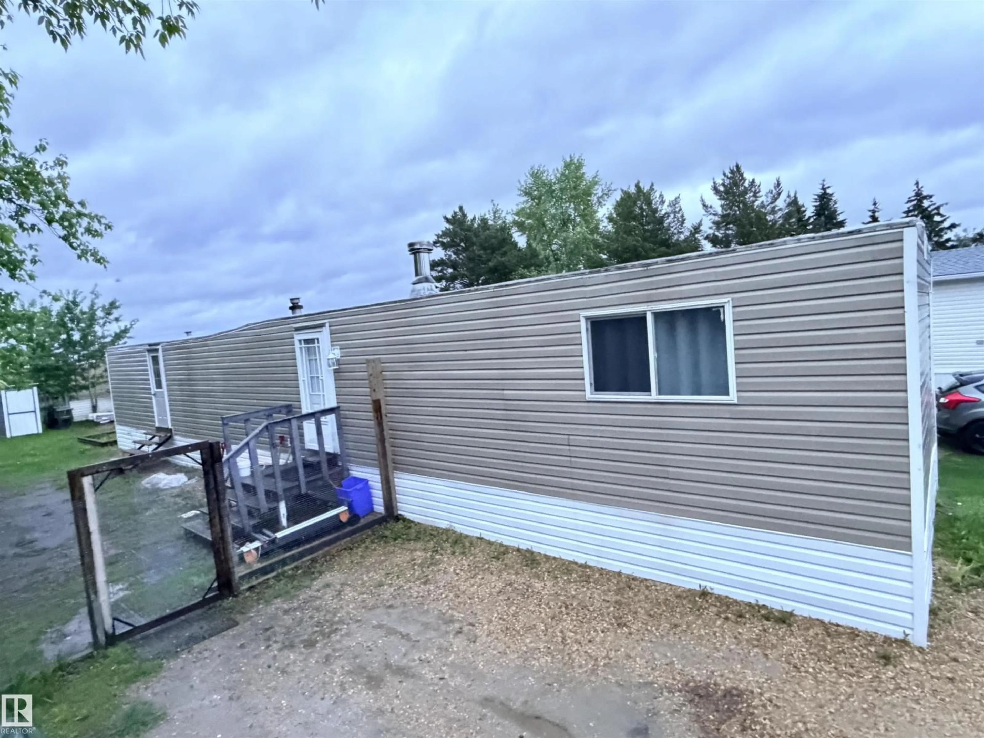 A pic from outside/outdoor area/front of a property/back of a property/a pic from drone, water/lake/river/ocean view for 9501 - 68 104 AV, Westlock Alberta T7P1M7