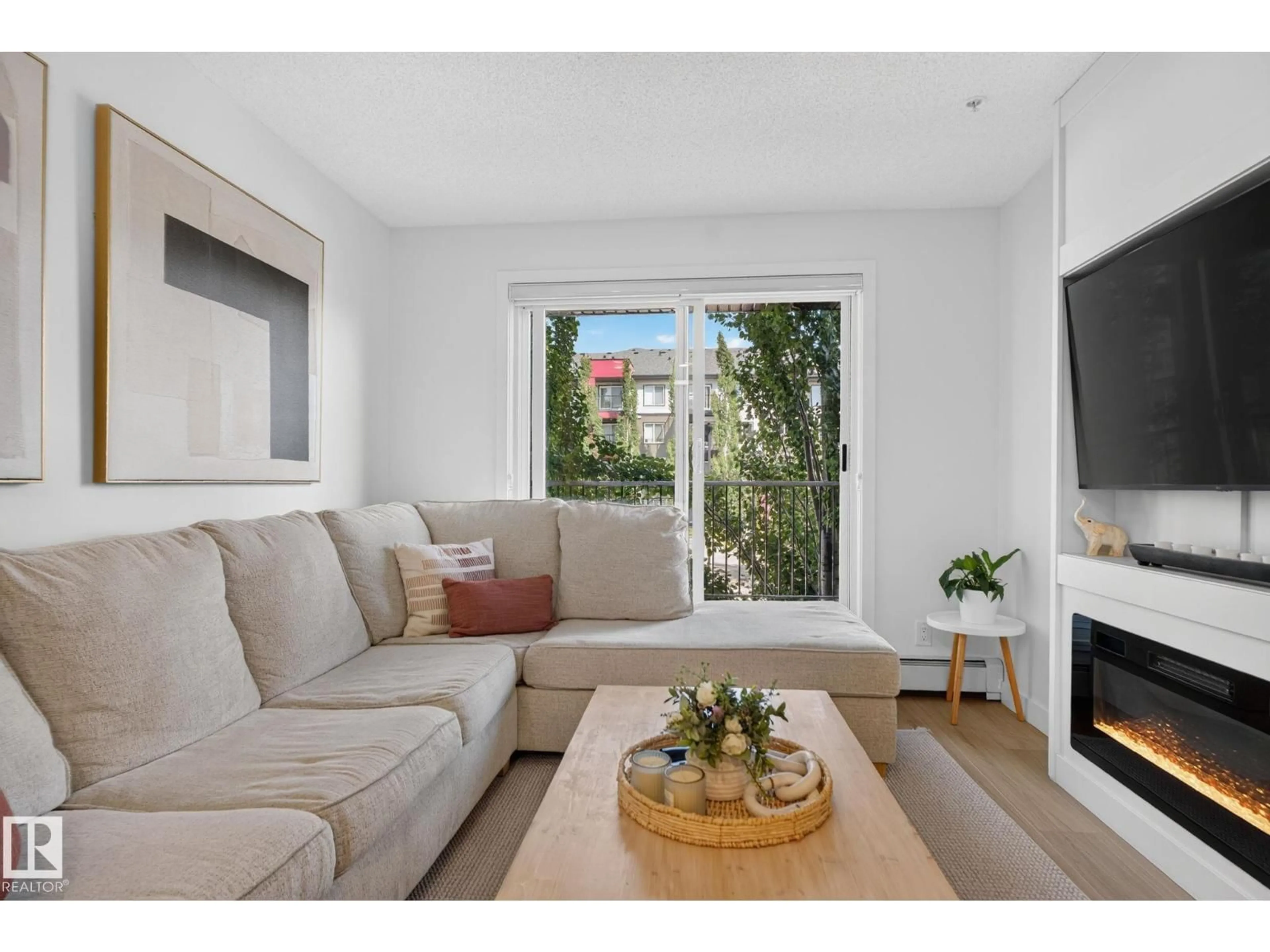 Living room with furniture, unknown for #203 - 5521 7 AV, Edmonton Alberta T6X2A8