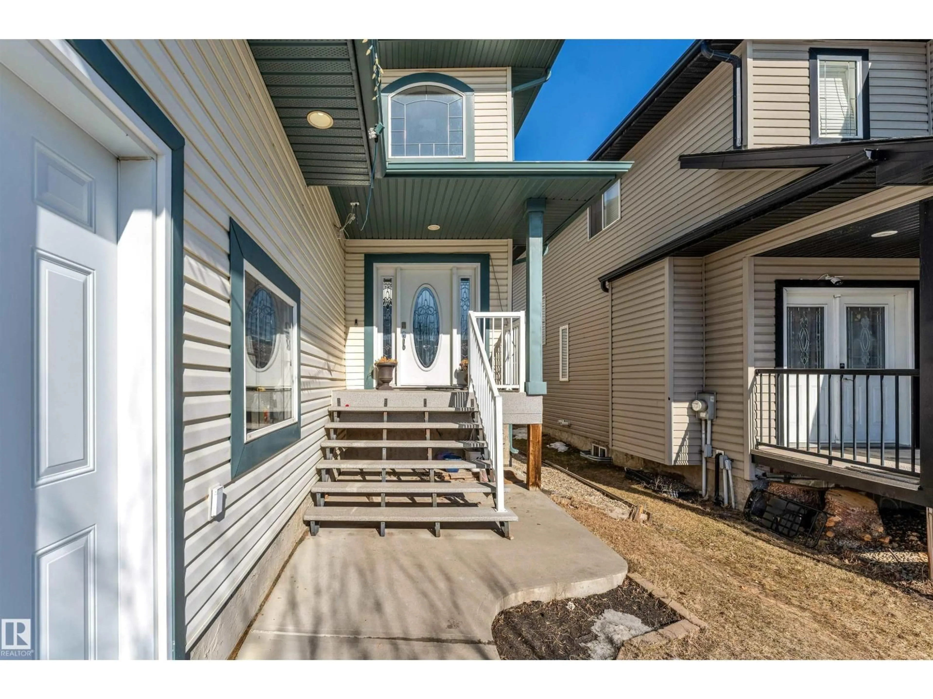 Home with vinyl exterior material, street for 4620 160 AV, Edmonton Alberta T5Y3M1