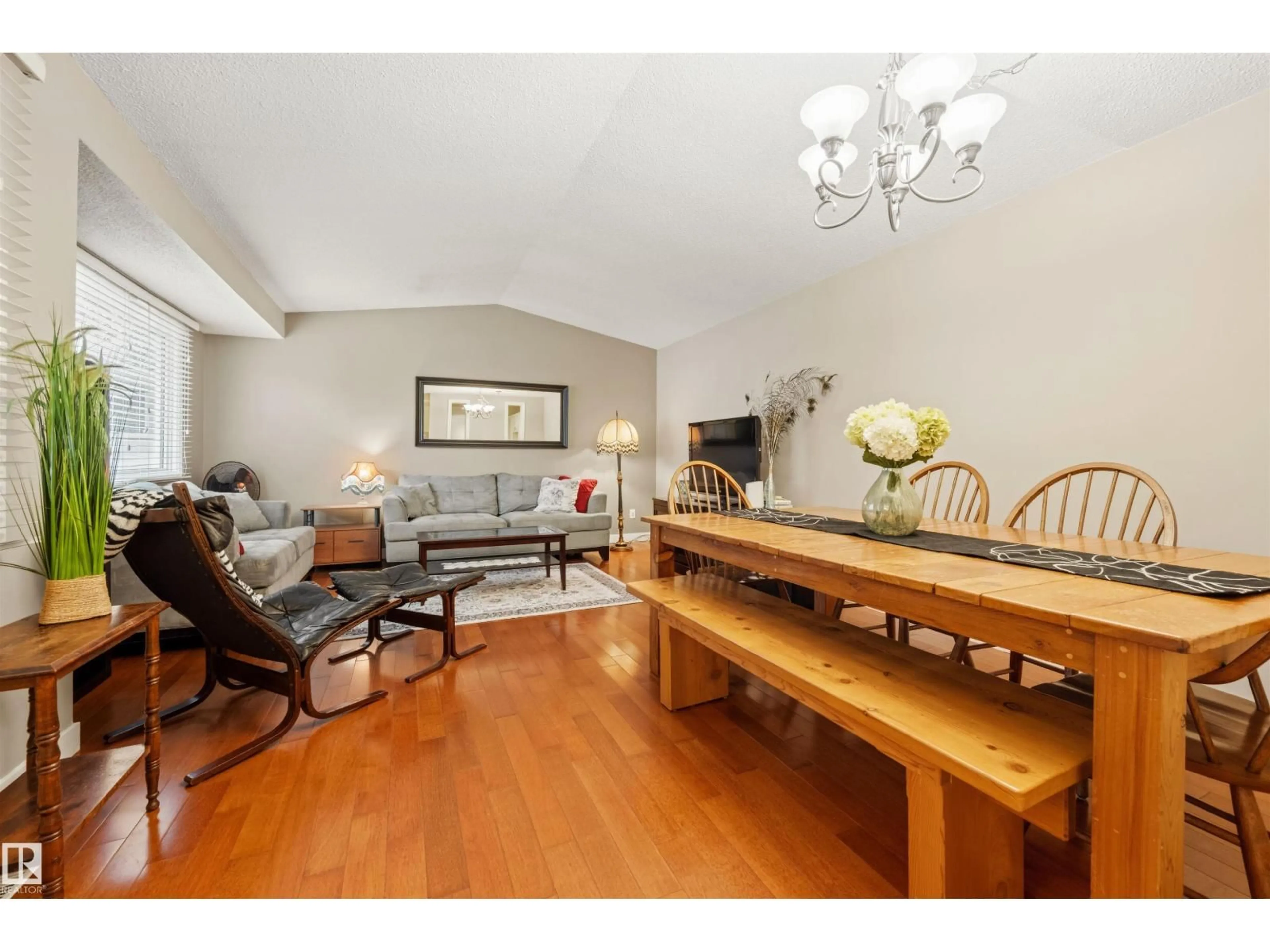 Living room with furniture, wood/laminate floor for 618 WILLOW CT, Edmonton Alberta T5T2K7
