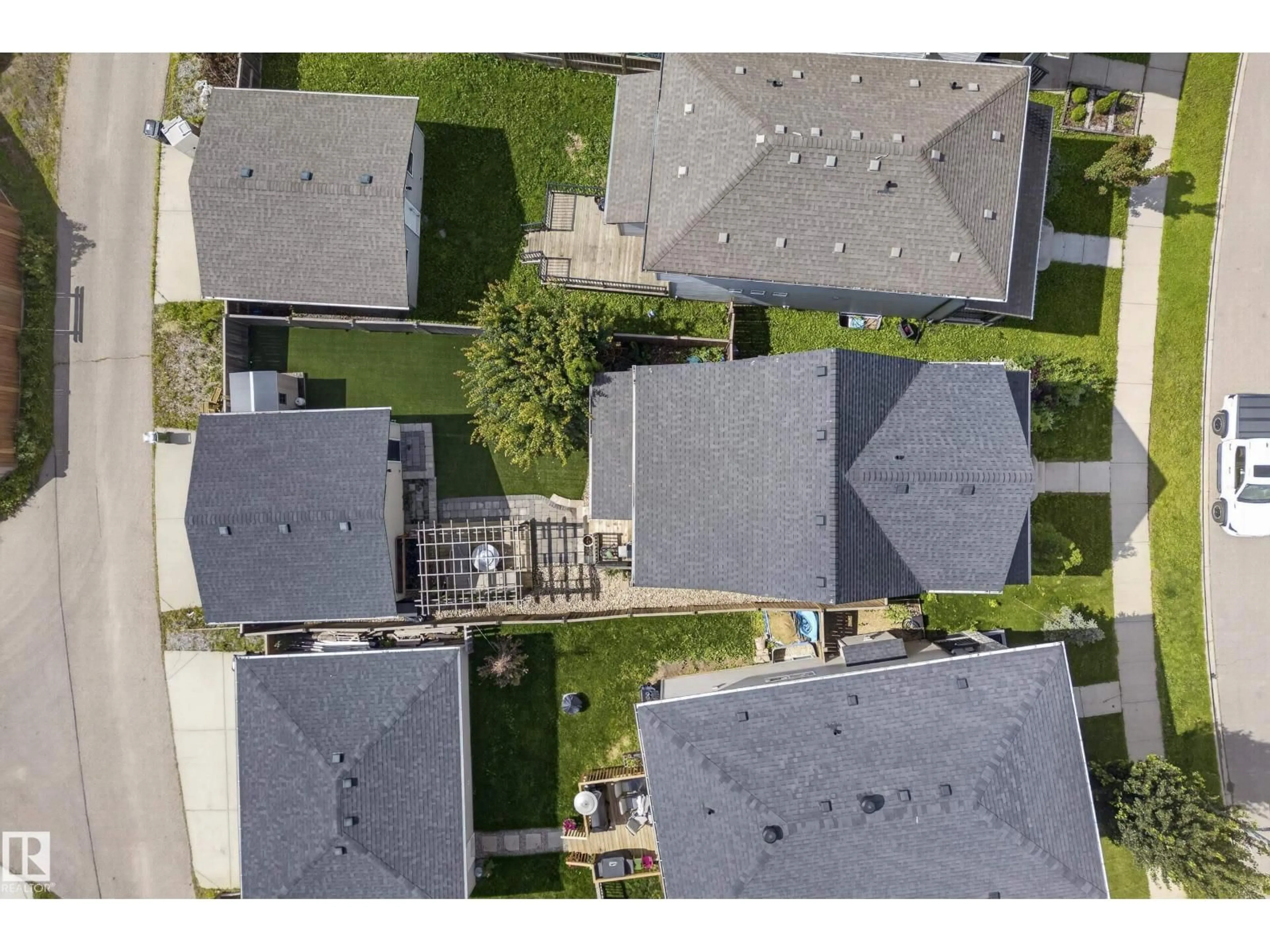 A pic from outside/outdoor area/front of a property/back of a property/a pic from drone, street for 21711 99 AV, Edmonton Alberta T5T4T7