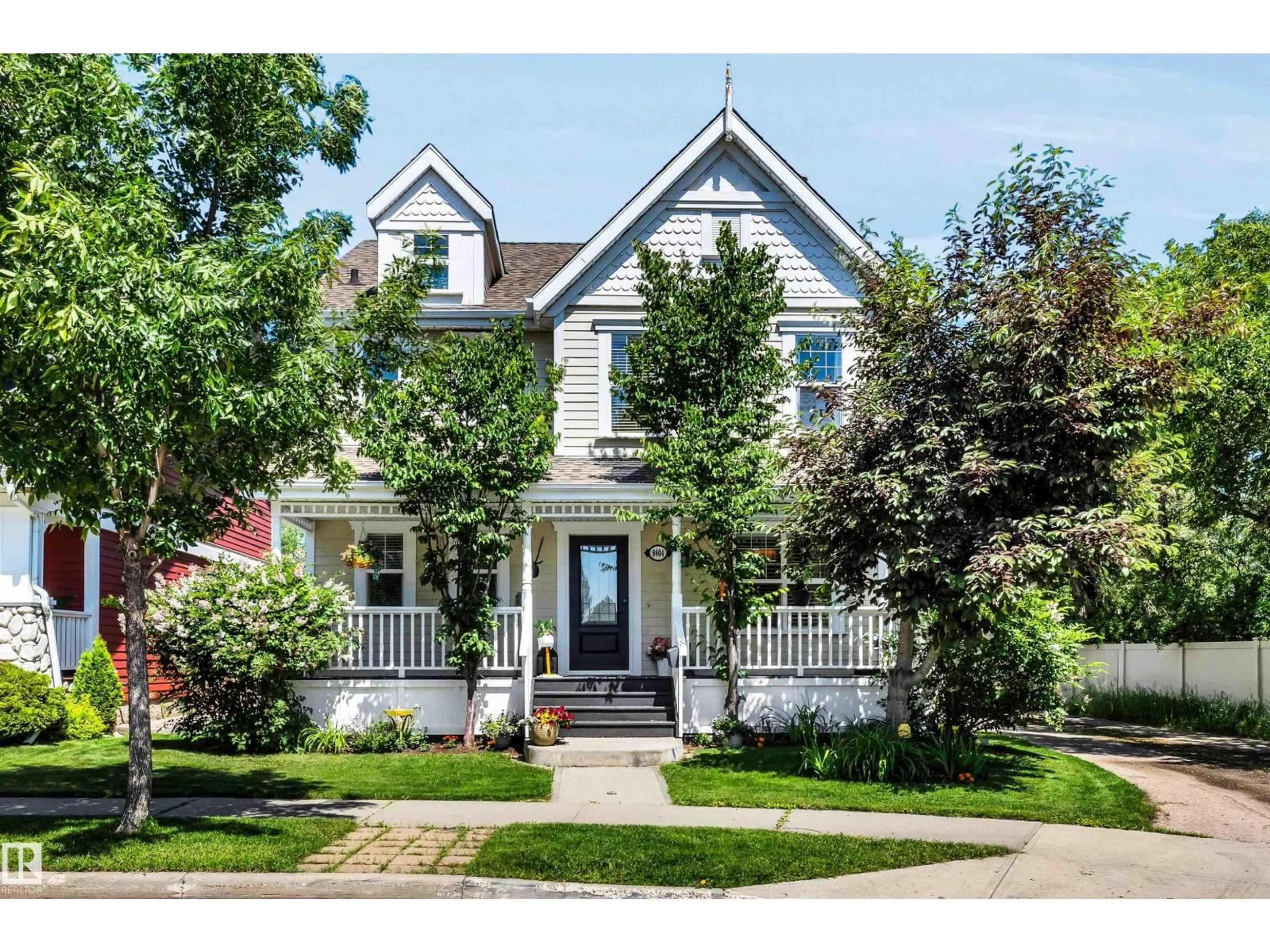 Home with brick exterior material, street for 9804 145 AV, Edmonton Alberta T5E6M1