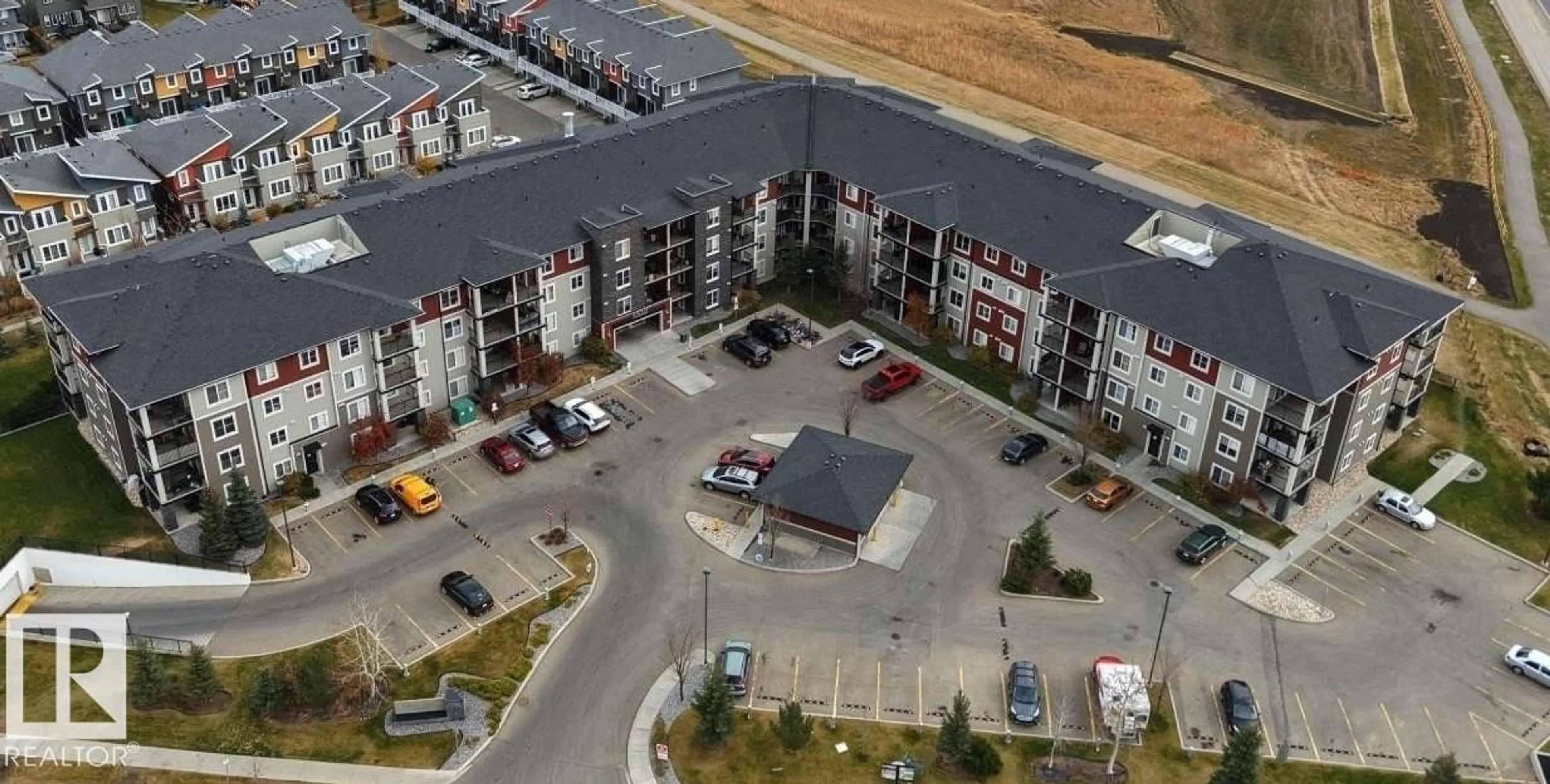 A pic from outside/outdoor area/front of a property/back of a property/a pic from drone, unknown for #118 - 1510 WATT DR, Edmonton Alberta T6X2E6