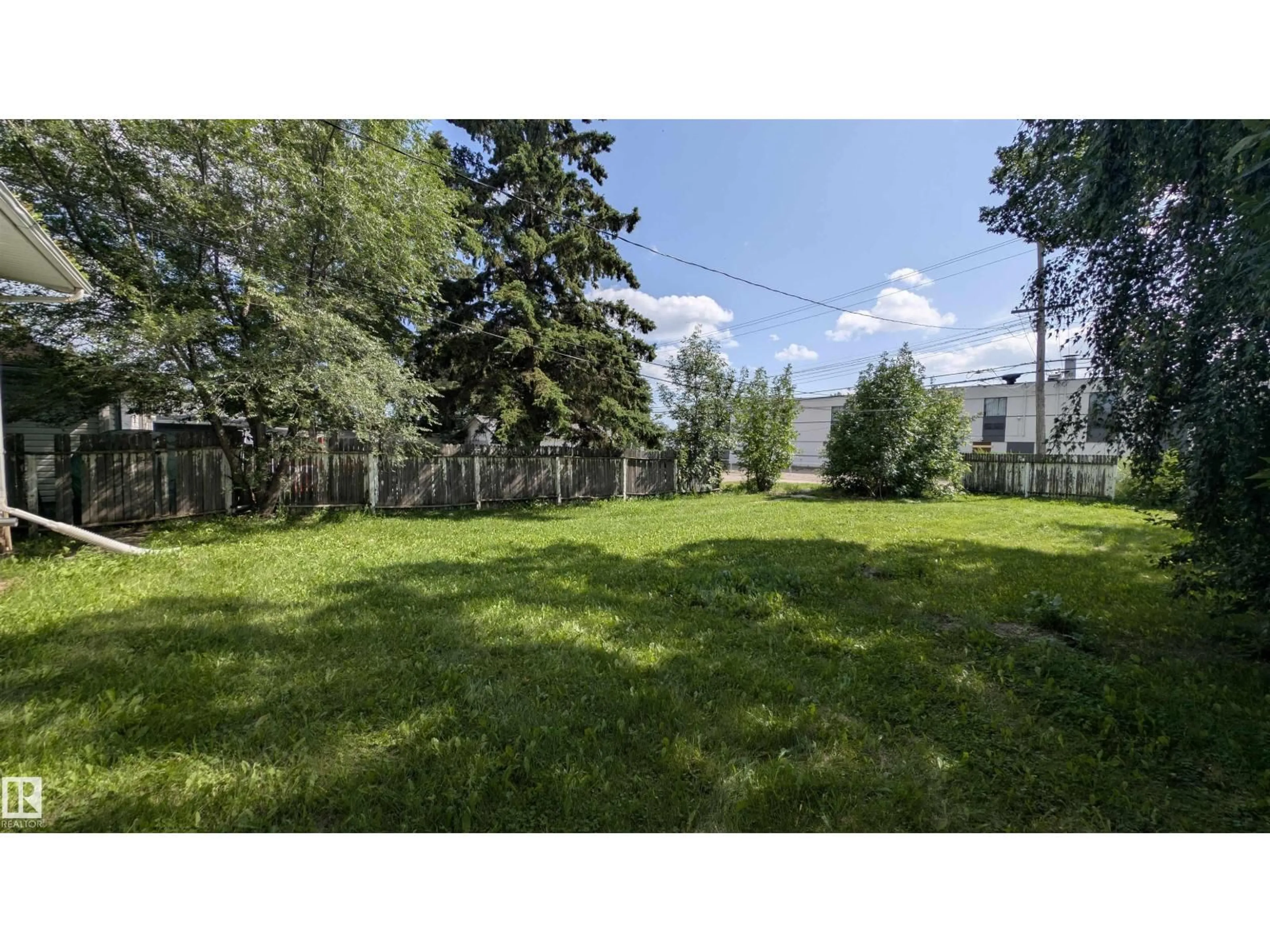 A pic from outside/outdoor area/front of a property/back of a property/a pic from drone, forest/trees view for 5216 51 AV, Bonnyville Town Alberta T9N2A7