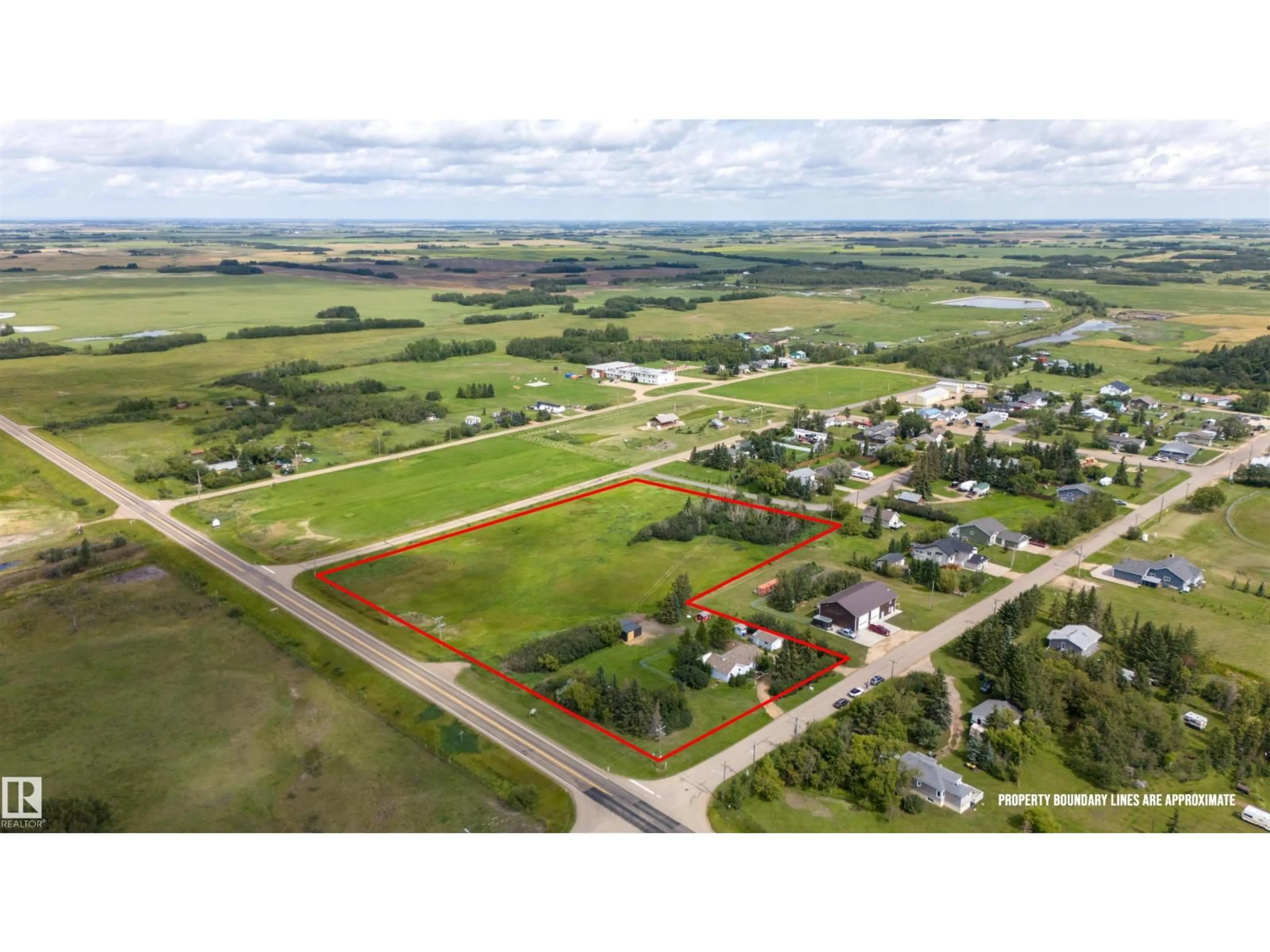 A pic from outside/outdoor area/front of a property/back of a property/a pic from drone, building for 20 TOWNSHIP RD, Rural Camrose County Alberta T5Y1R4