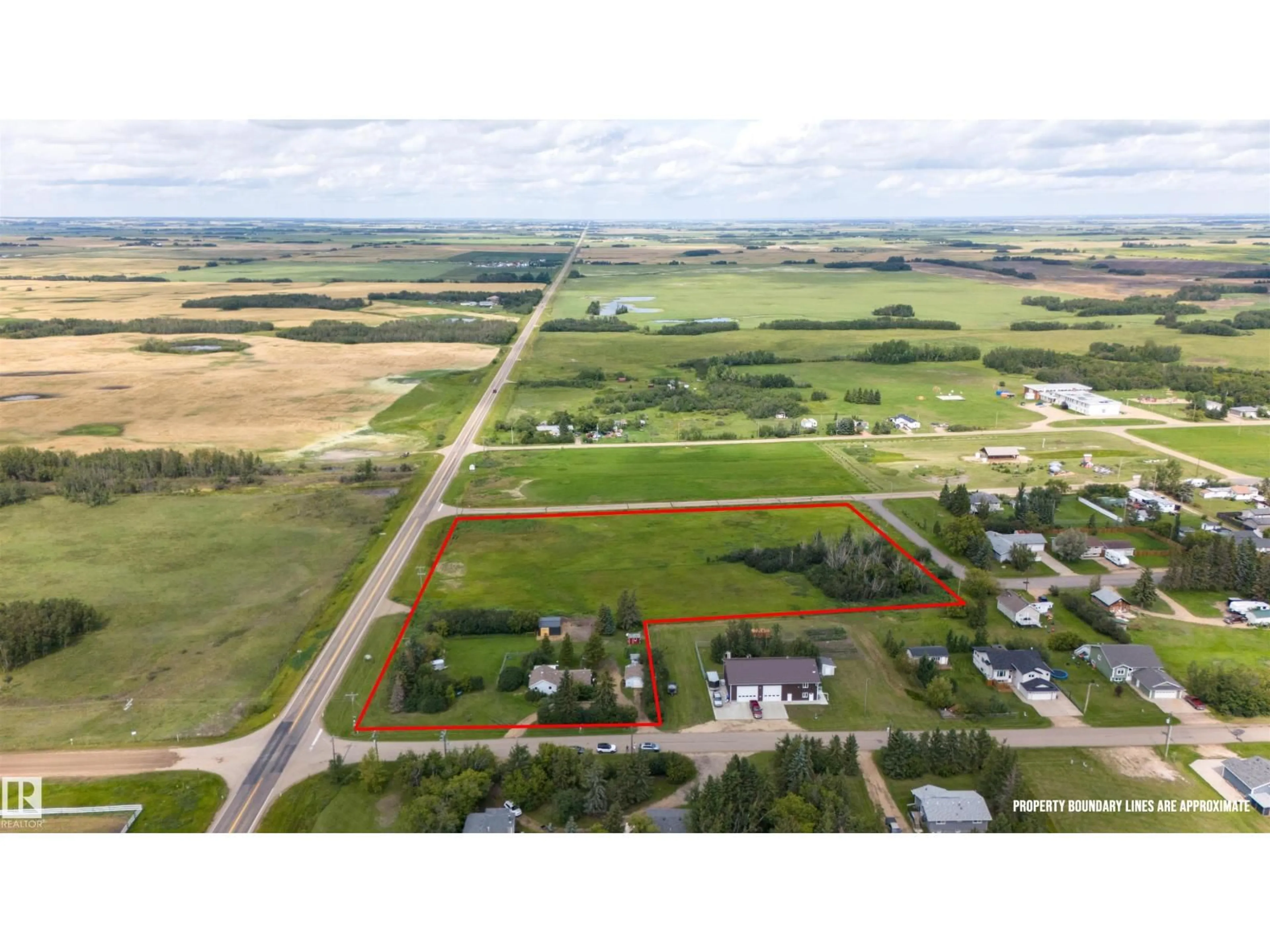 A pic from outside/outdoor area/front of a property/back of a property/a pic from drone, street for 20 TOWNSHIP RD, Rural Camrose County Alberta T5Y1R4