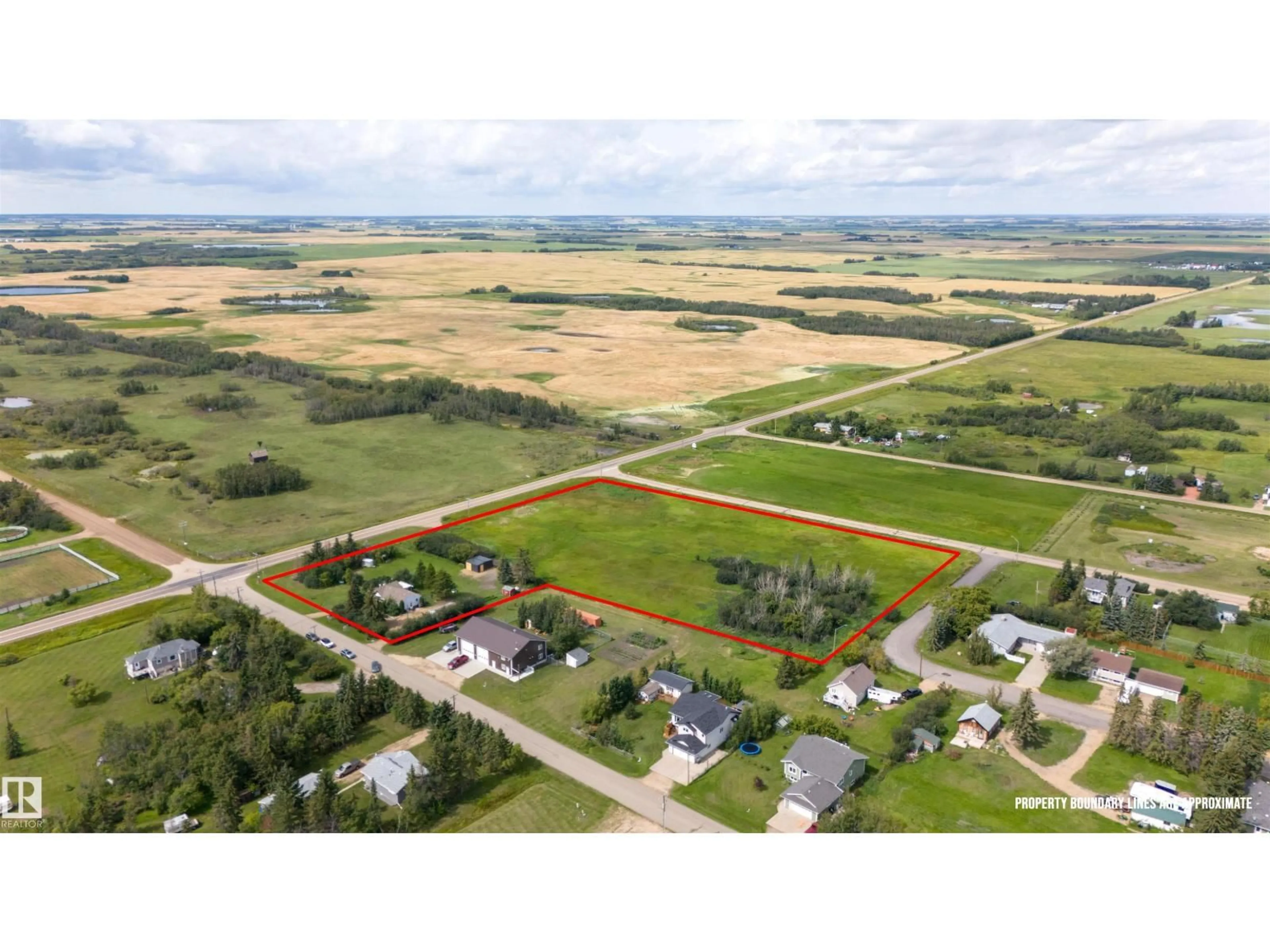 A pic from outside/outdoor area/front of a property/back of a property/a pic from drone, street for 20 TOWNSHIP RD, Rural Camrose County Alberta T5Y1R4