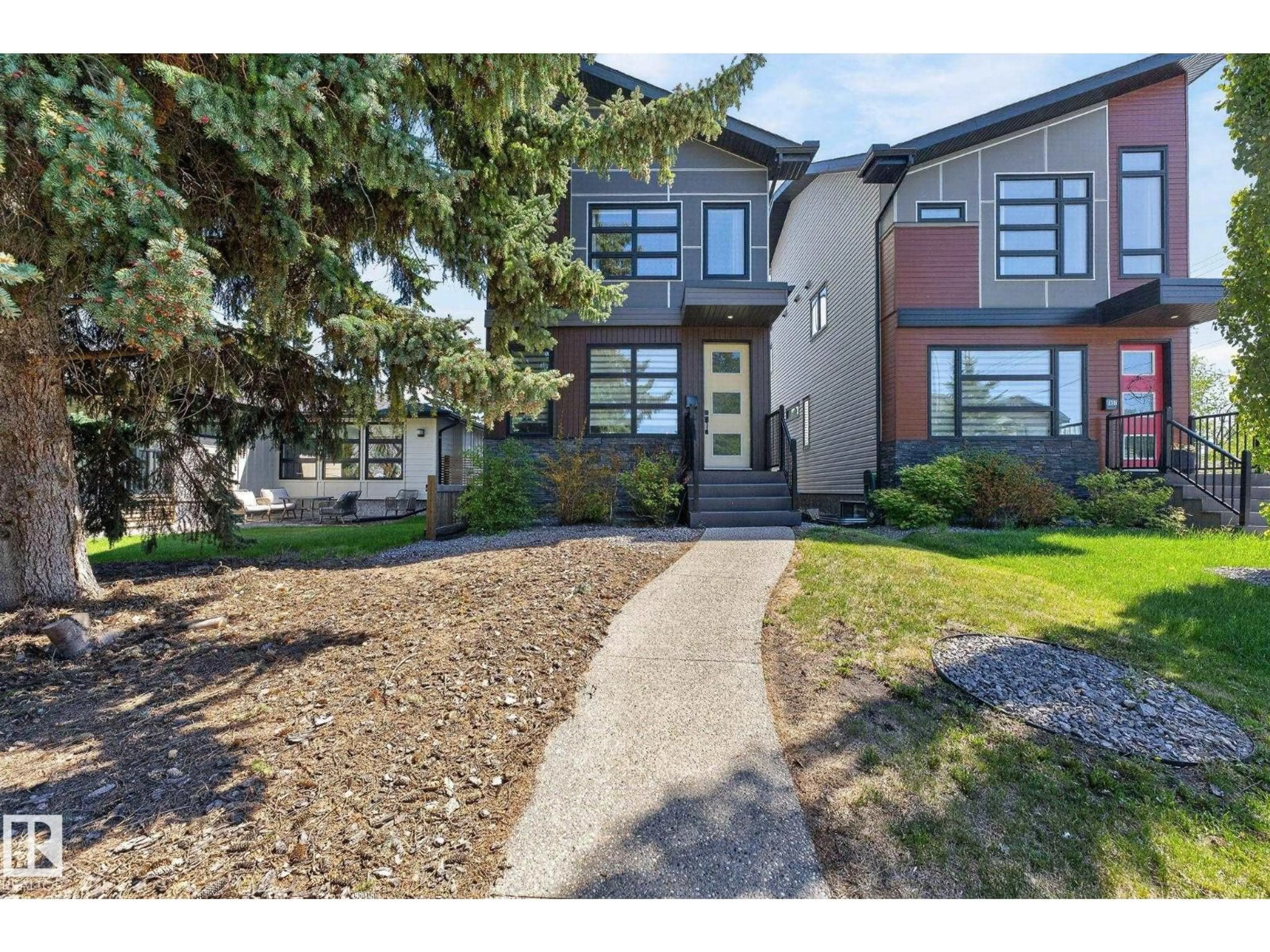 Home with brick exterior material, street for 8809 148 ST, Edmonton Alberta T5R0Z8