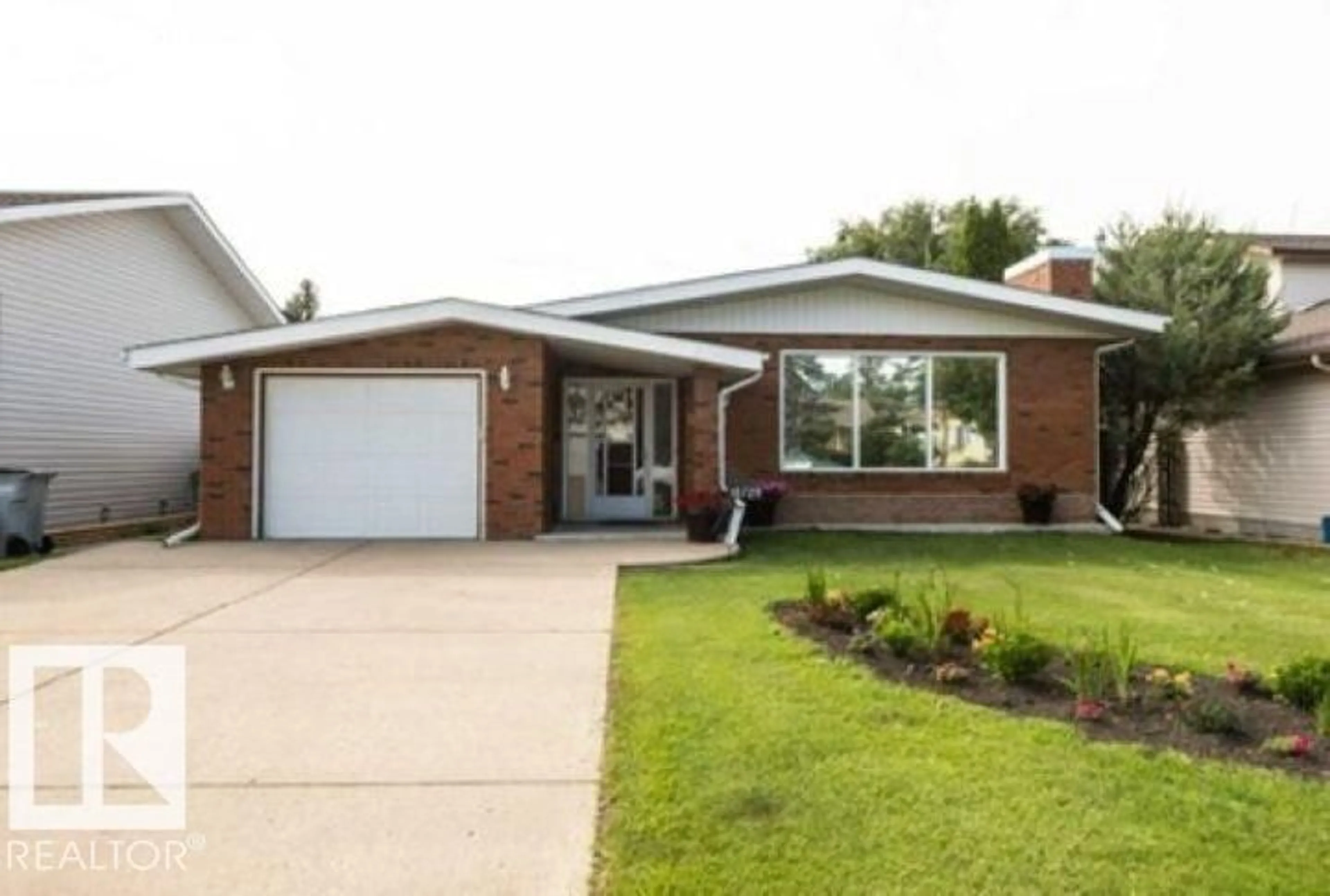 Home with brick exterior material, street for 10729 018A AV, Westlock Alberta T7P1C5