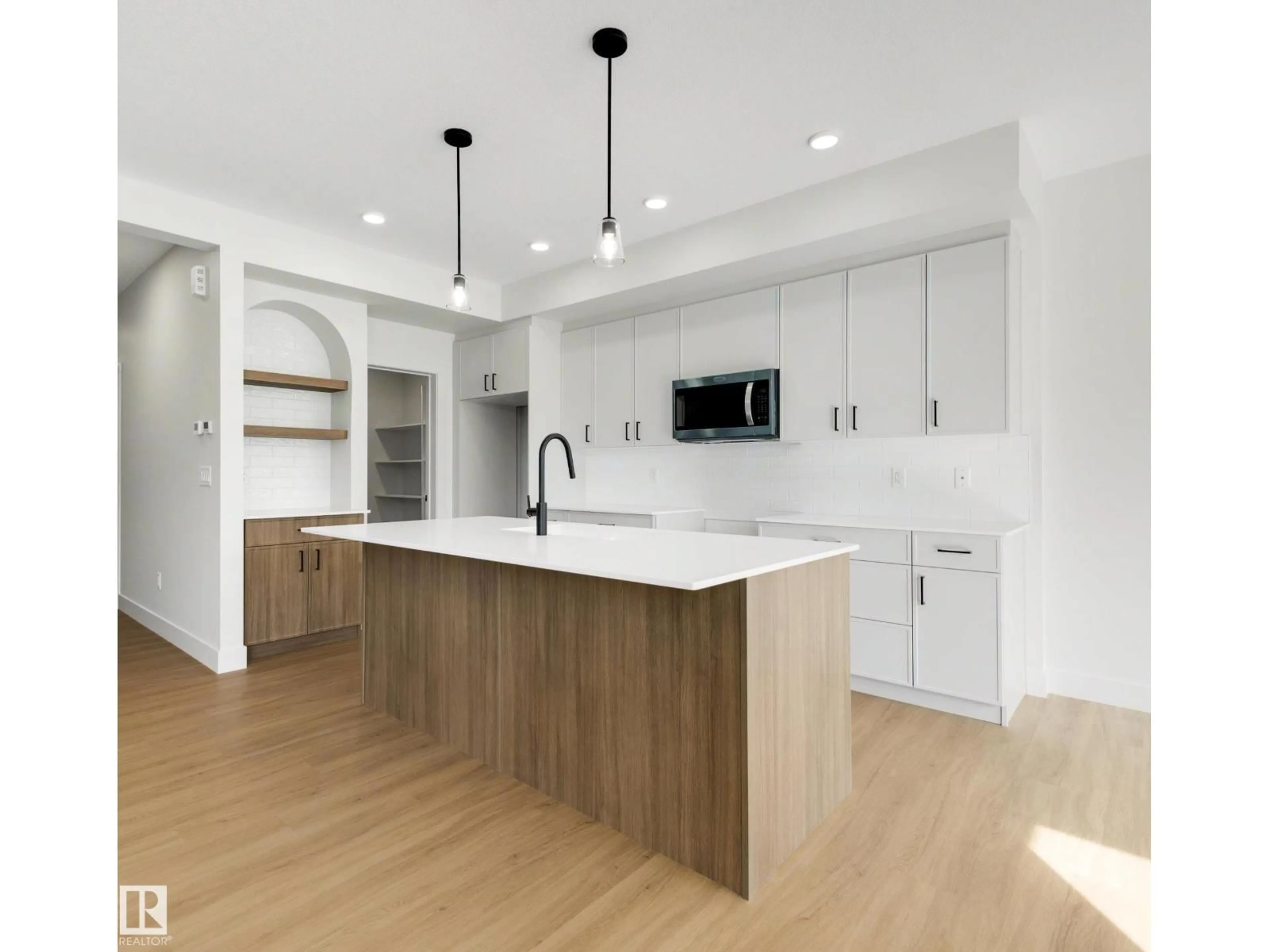 Open concept kitchen, wood/laminate floor for 16 GRAYSON GR, Stony Plain Alberta T7Z0A0