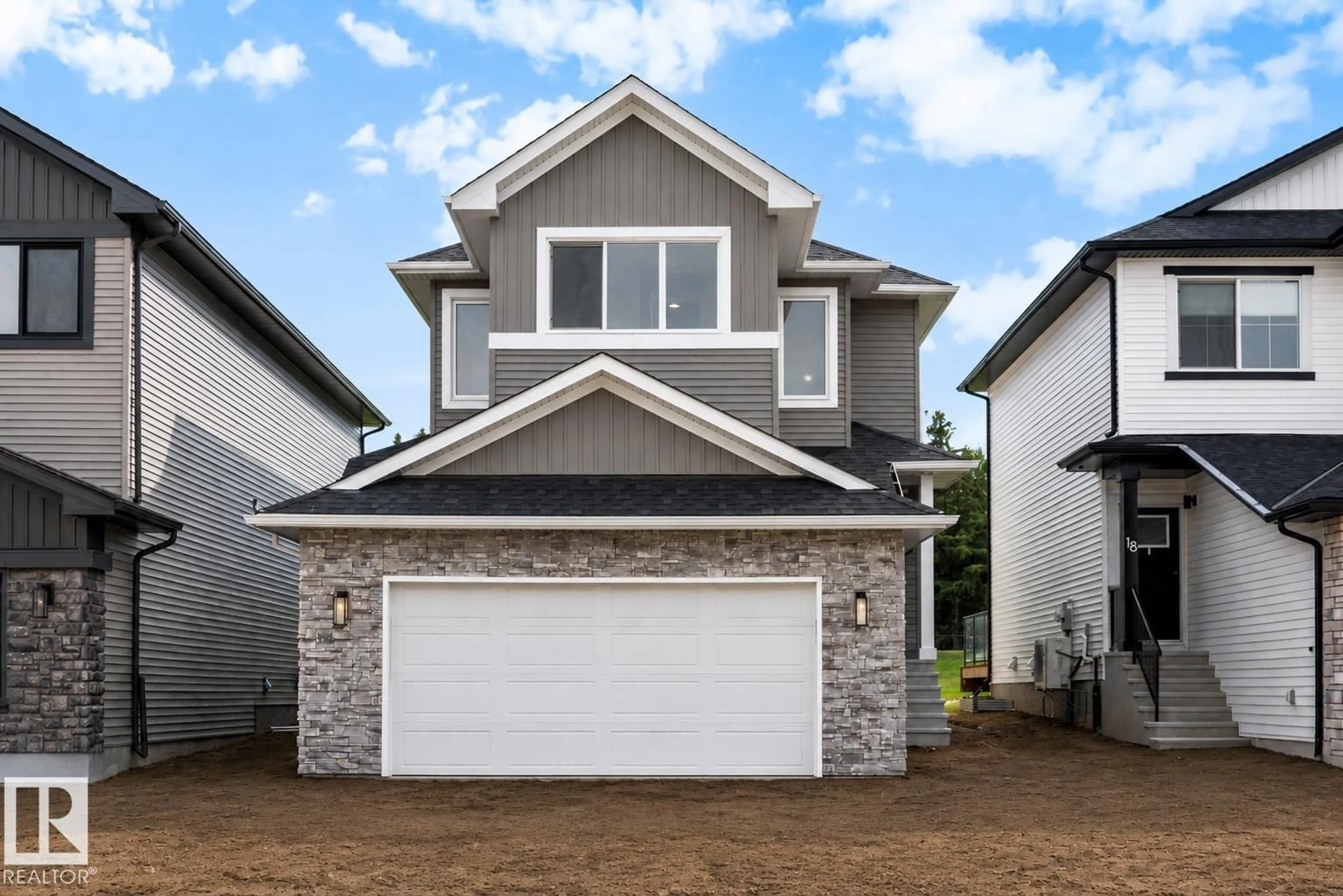 Home with vinyl exterior material, street for 16 GRAYSON GR, Stony Plain Alberta T7Z0A0