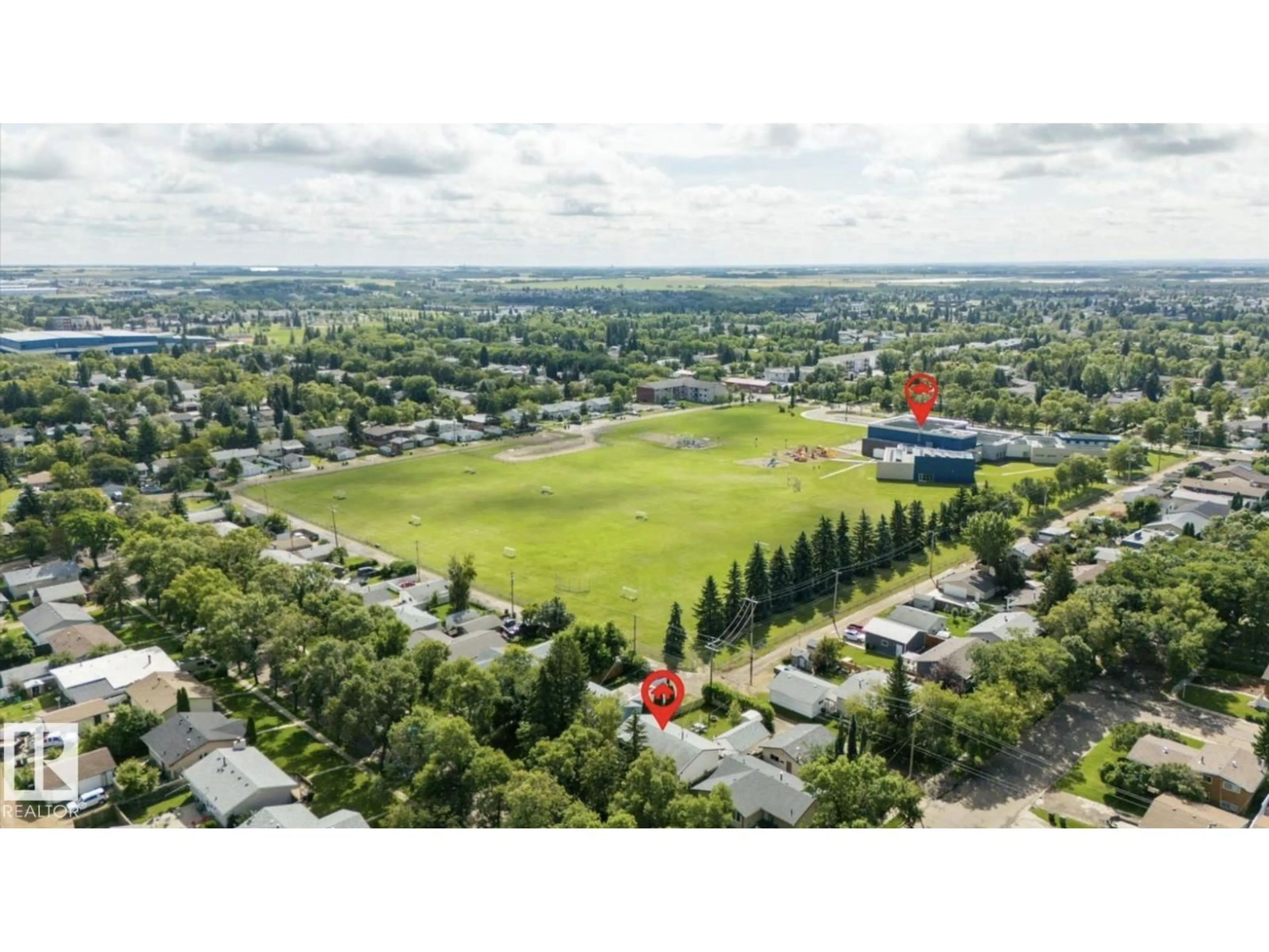 A pic from outside/outdoor area/front of a property/back of a property/a pic from drone, mountain view for 6221 44B AVENUE, Camrose Alberta T4V0B5