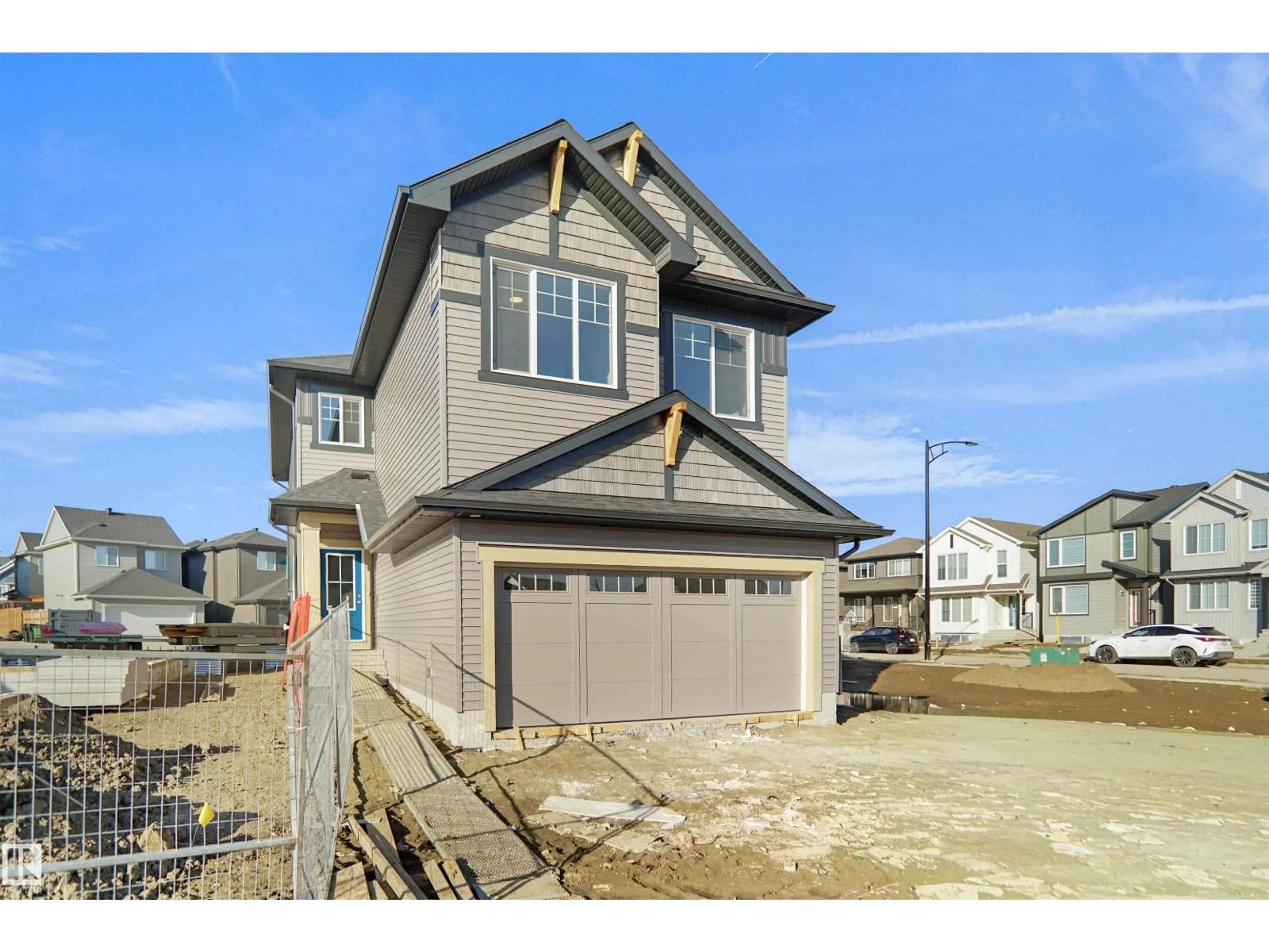 Home with vinyl exterior material, street for 22940 82 AV, Edmonton Alberta T5T4H5