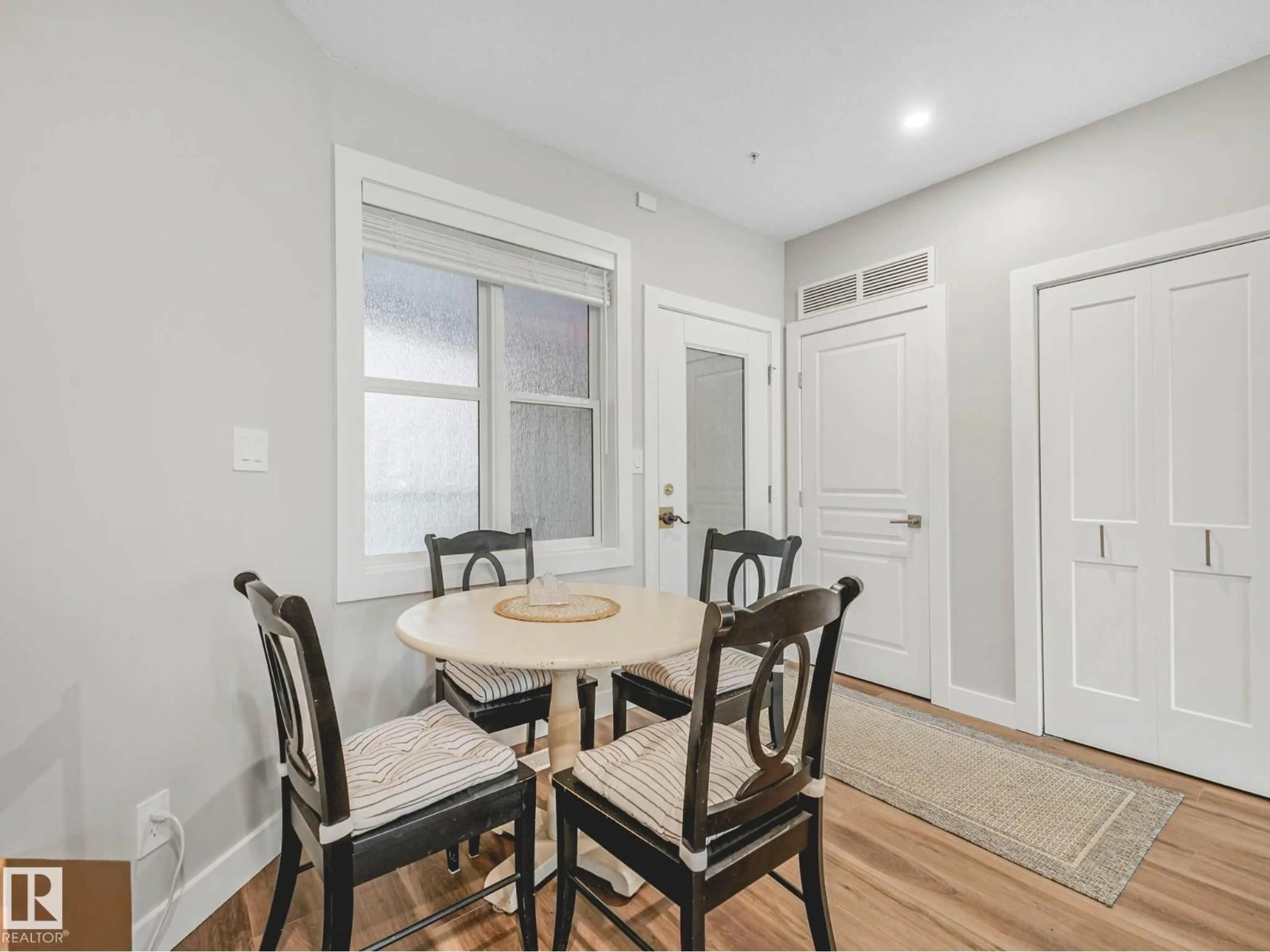 Dining room, wood/laminate floor for #302 - 11025 83 AV, Edmonton Alberta T6G2V5