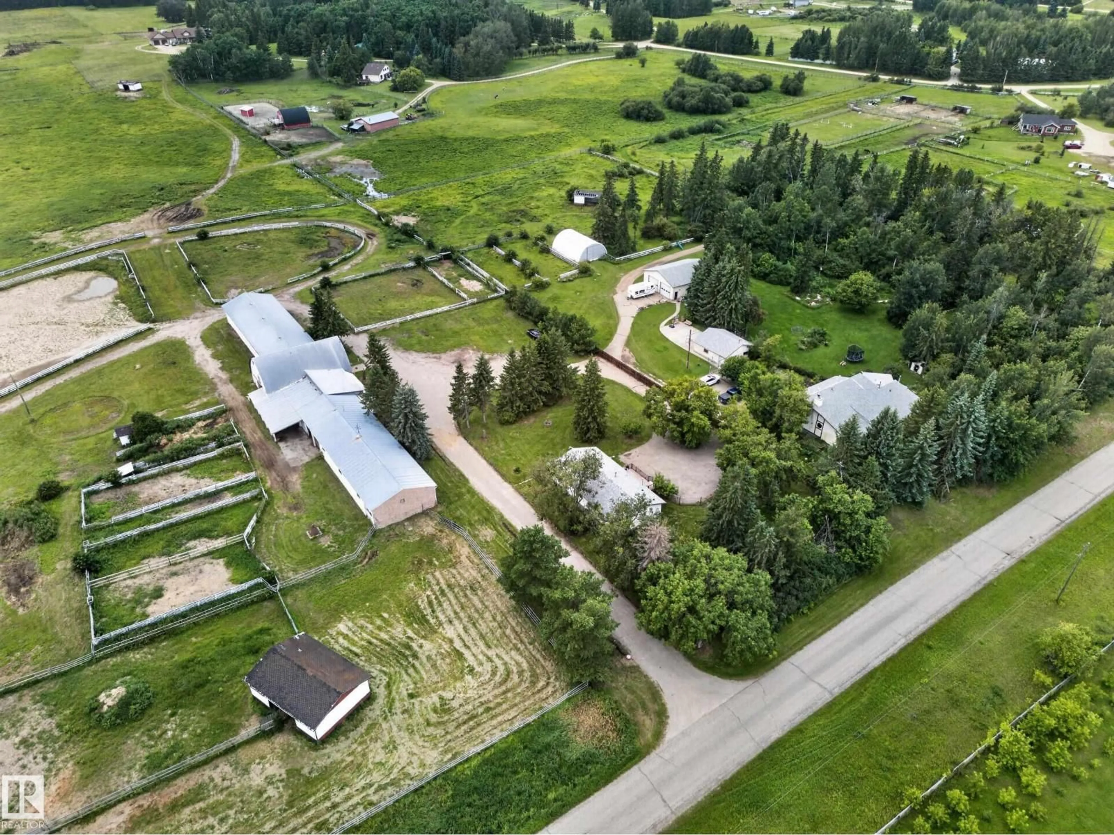 A pic from outside/outdoor area/front of a property/back of a property/a pic from drone, unknown for 51208 RANGE ROAD 270, Rural Parkland County Alberta T7Y1G7